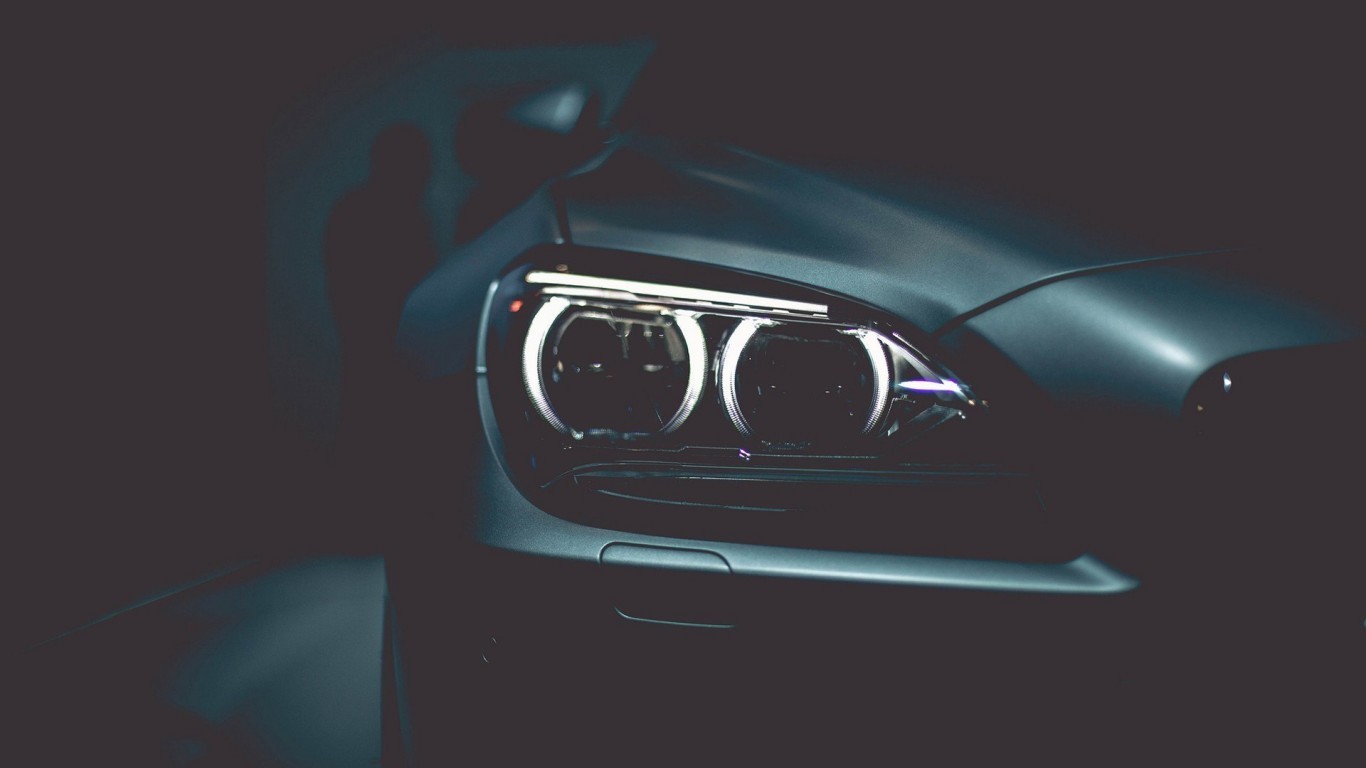 Close-up of a BMW car headlight HD Wallpaper