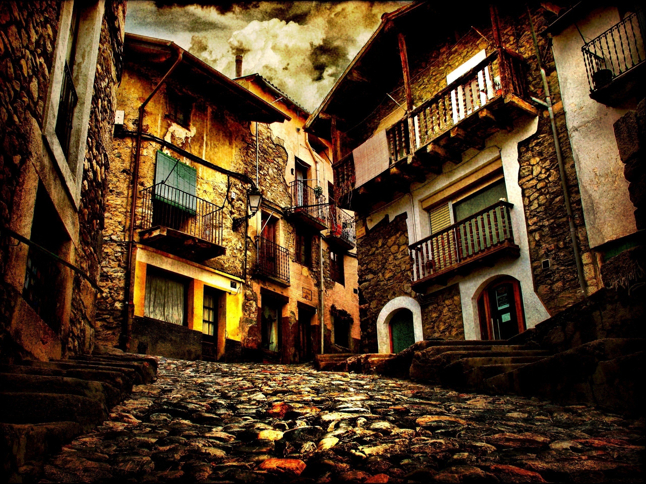 Old stone street in a European village HD Wallpaper