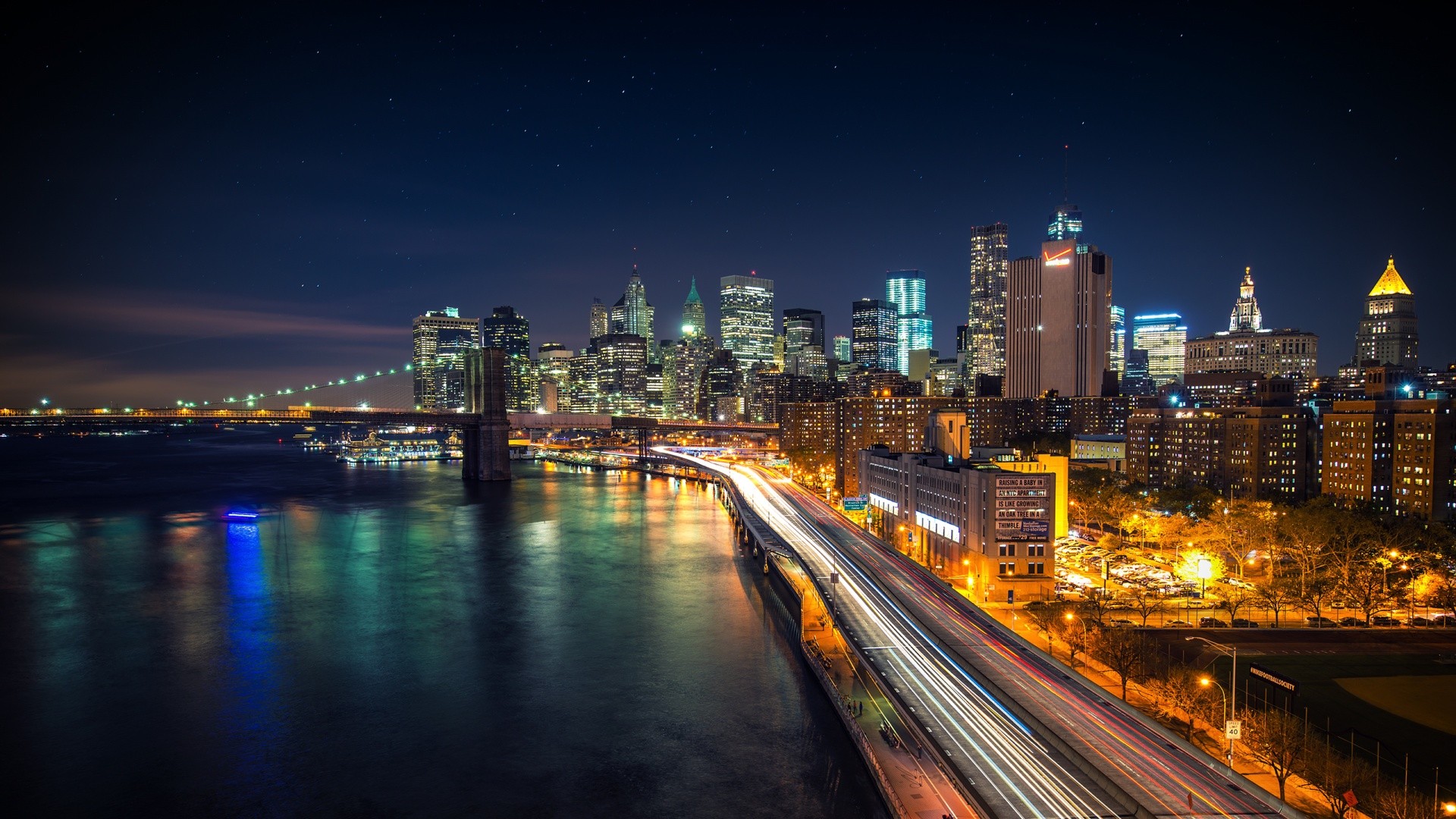 New York City Skyline at Night with Brooklyn Bridge HD Wallpaper