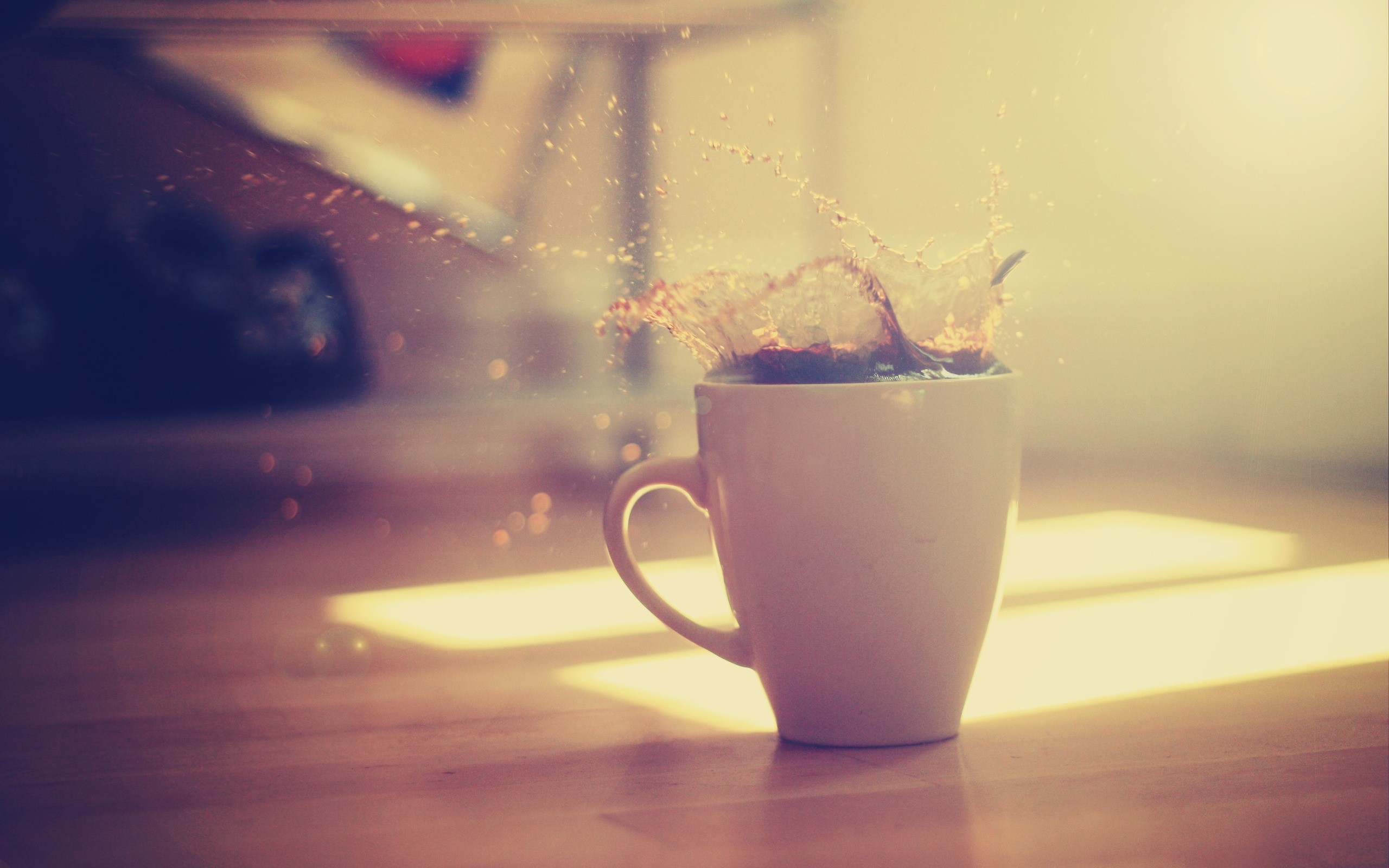 Coffee splashing into a white mug HD Wallpaper