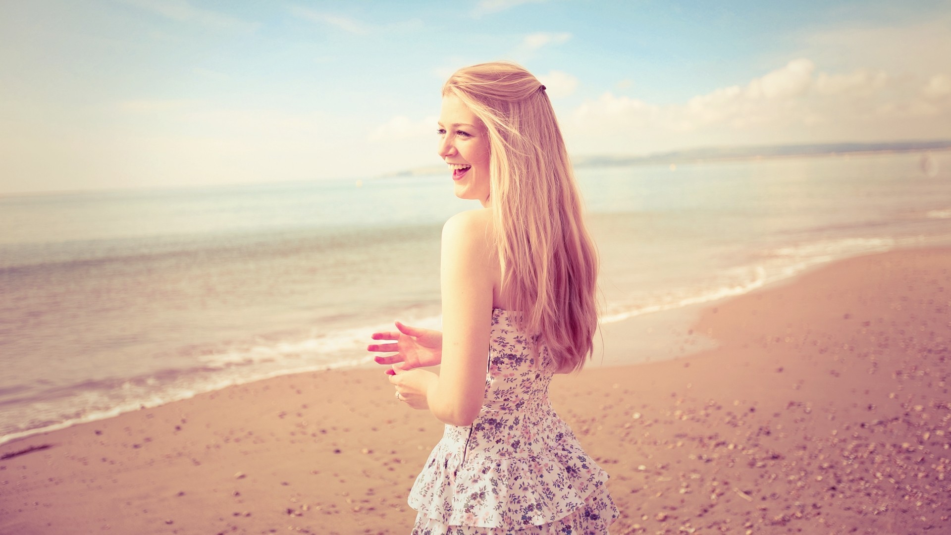 Woman with long blonde hair on a beach HD Wallpaper