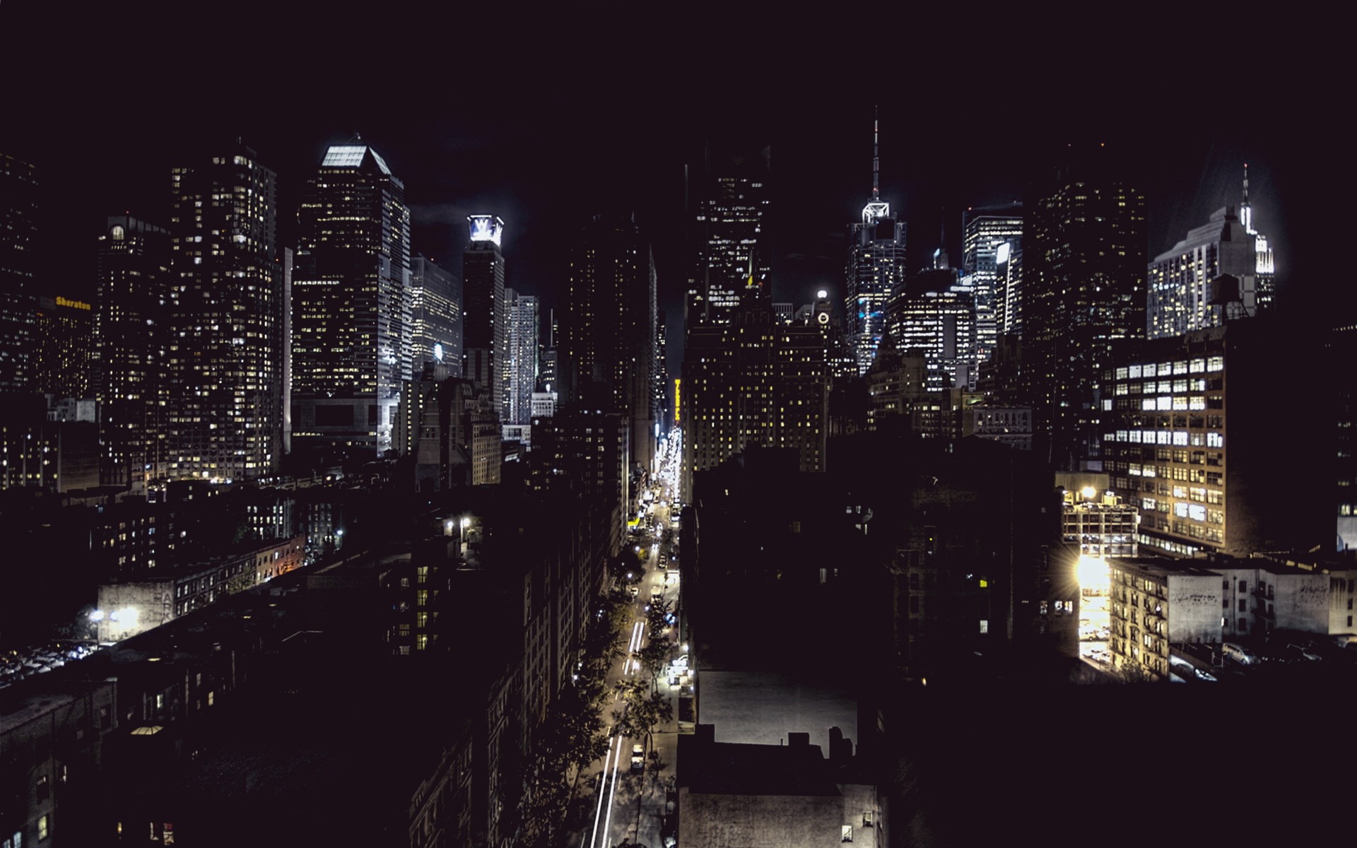 Night cityscape with illuminated skyscrapers and streetlights HD Wallpaper