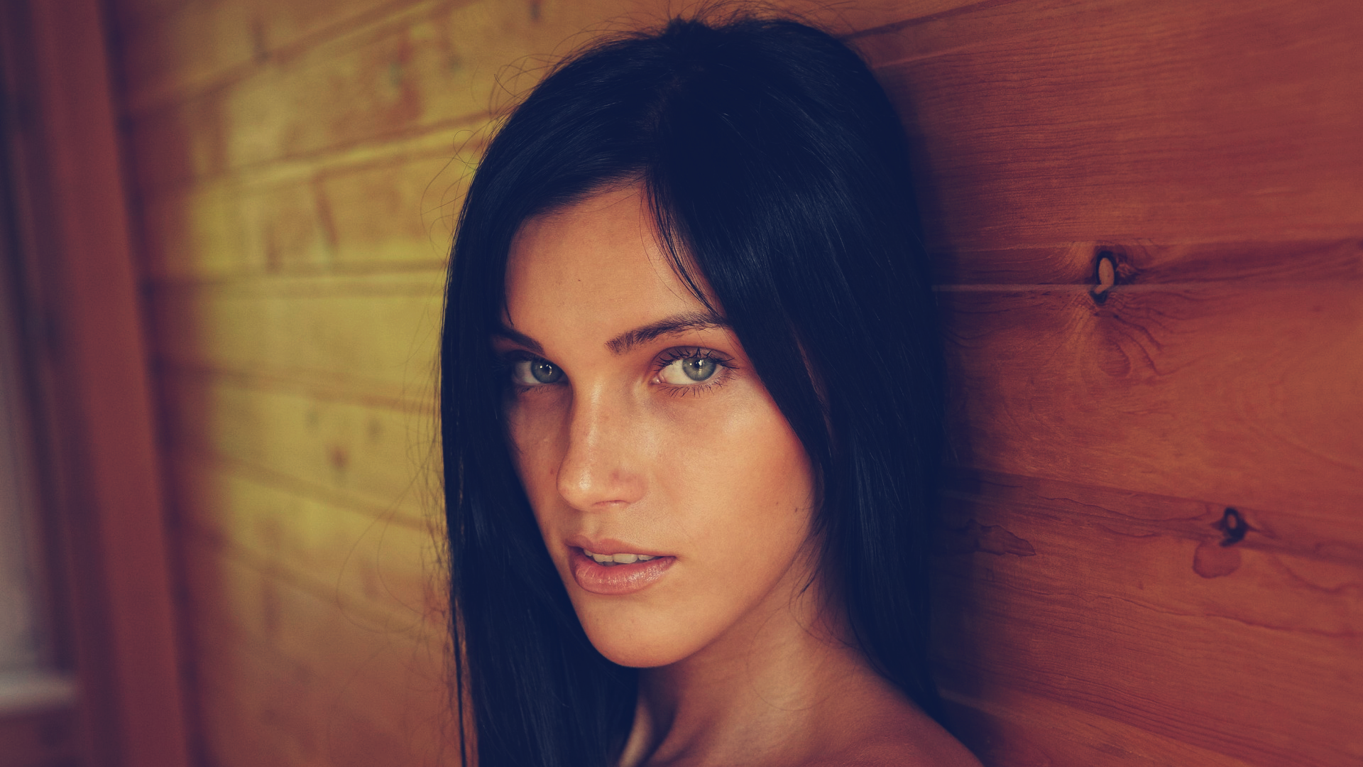 Portrait of a young woman with dark hair HD Wallpaper