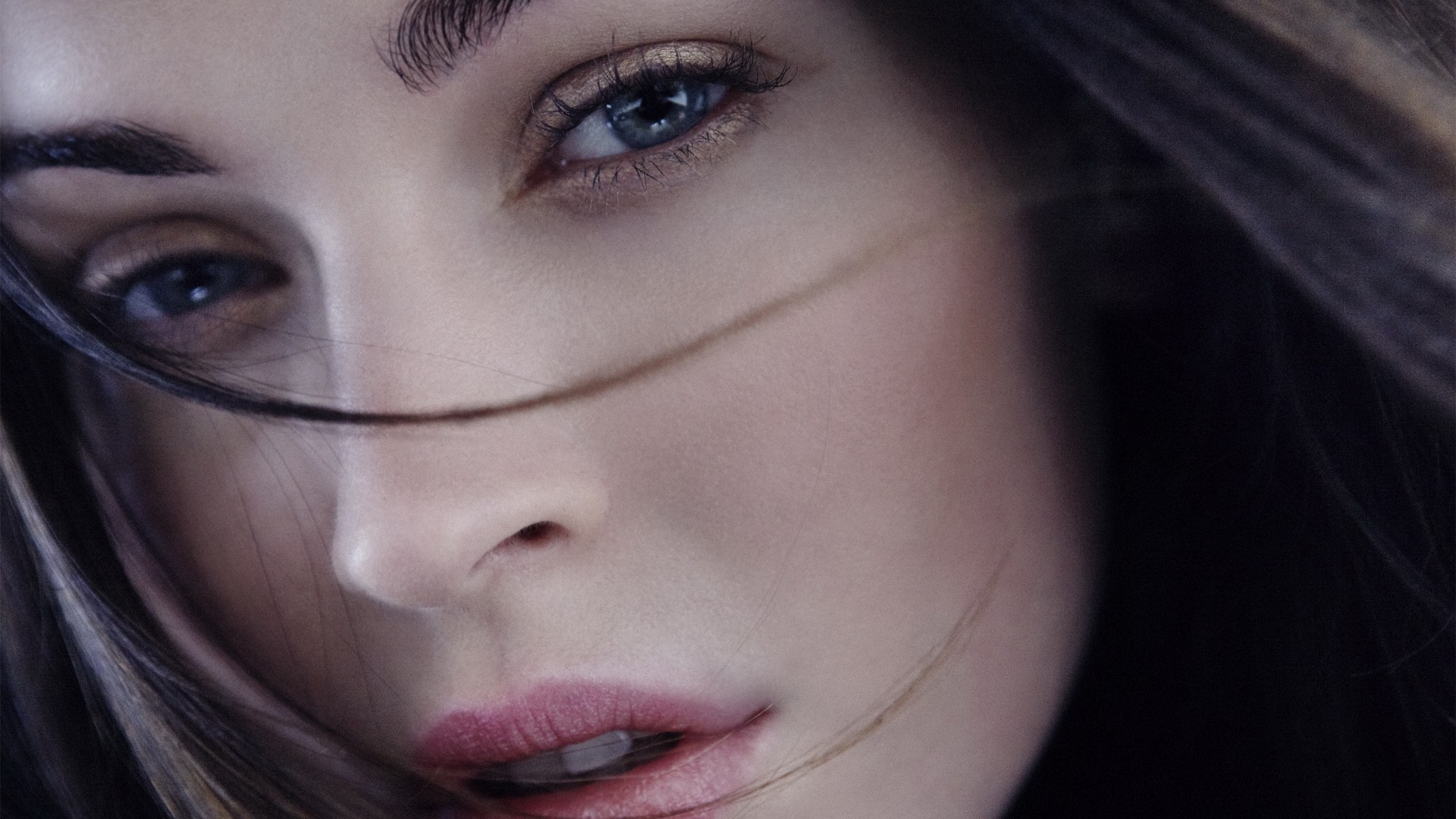 Close-up of a woman's face with makeup HD Wallpaper