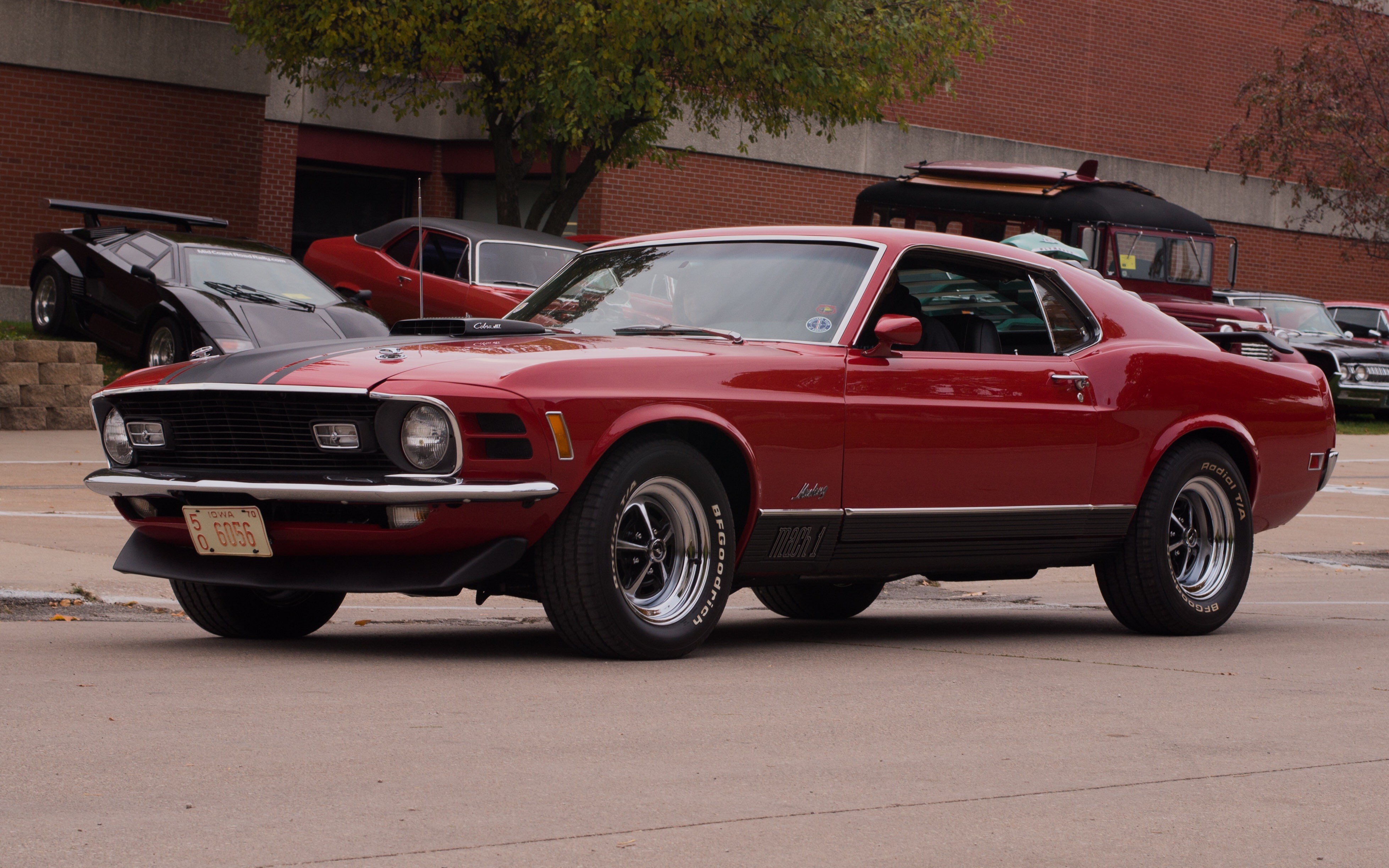 Red Ford Mustang Mach 1 parked outdoors HD Wallpaper