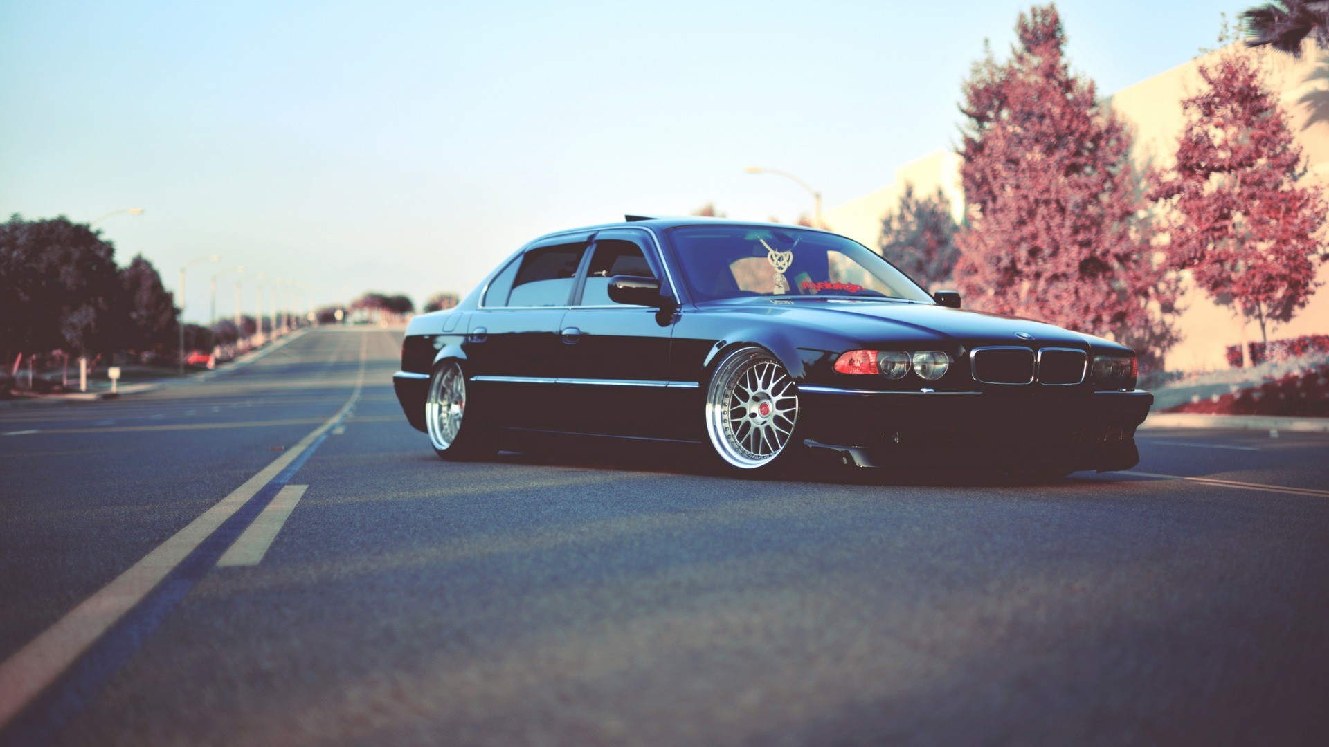 Black BMW E38 750il on a road HD Wallpaper