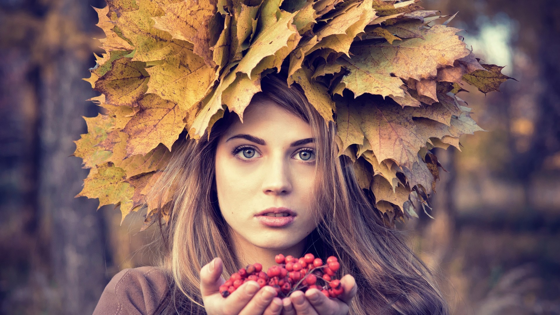 Woman with autumn leaves and berries HD Wallpaper