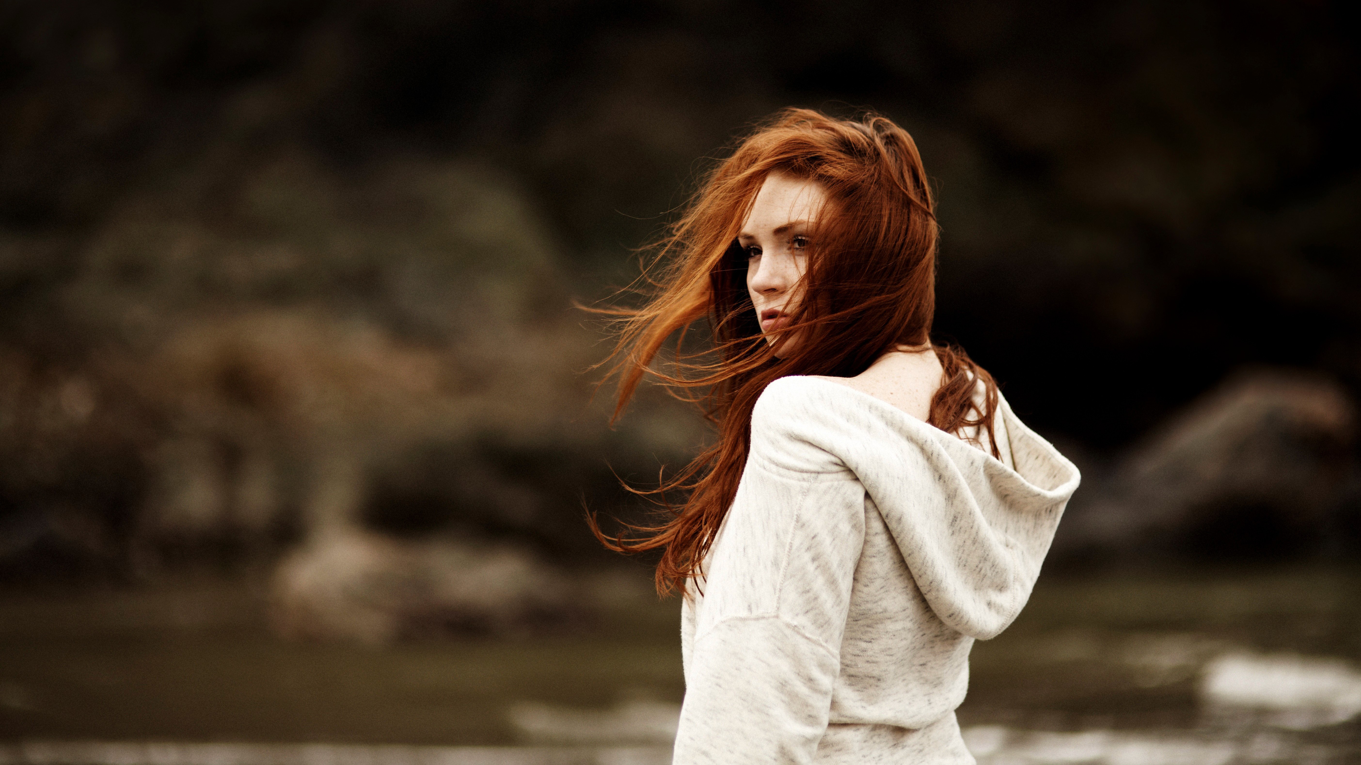 Redhead woman in a hoodie outdoors HD Wallpaper