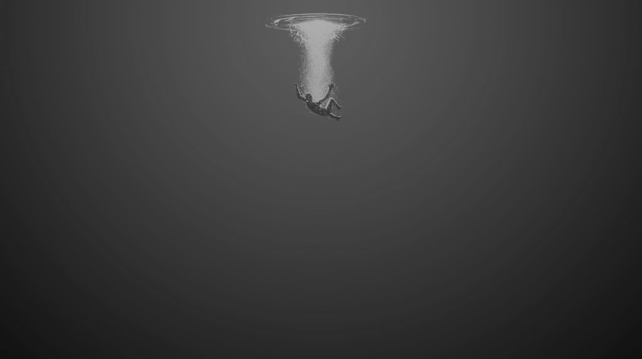 Monochrome image of a person falling underwater HD Wallpaper