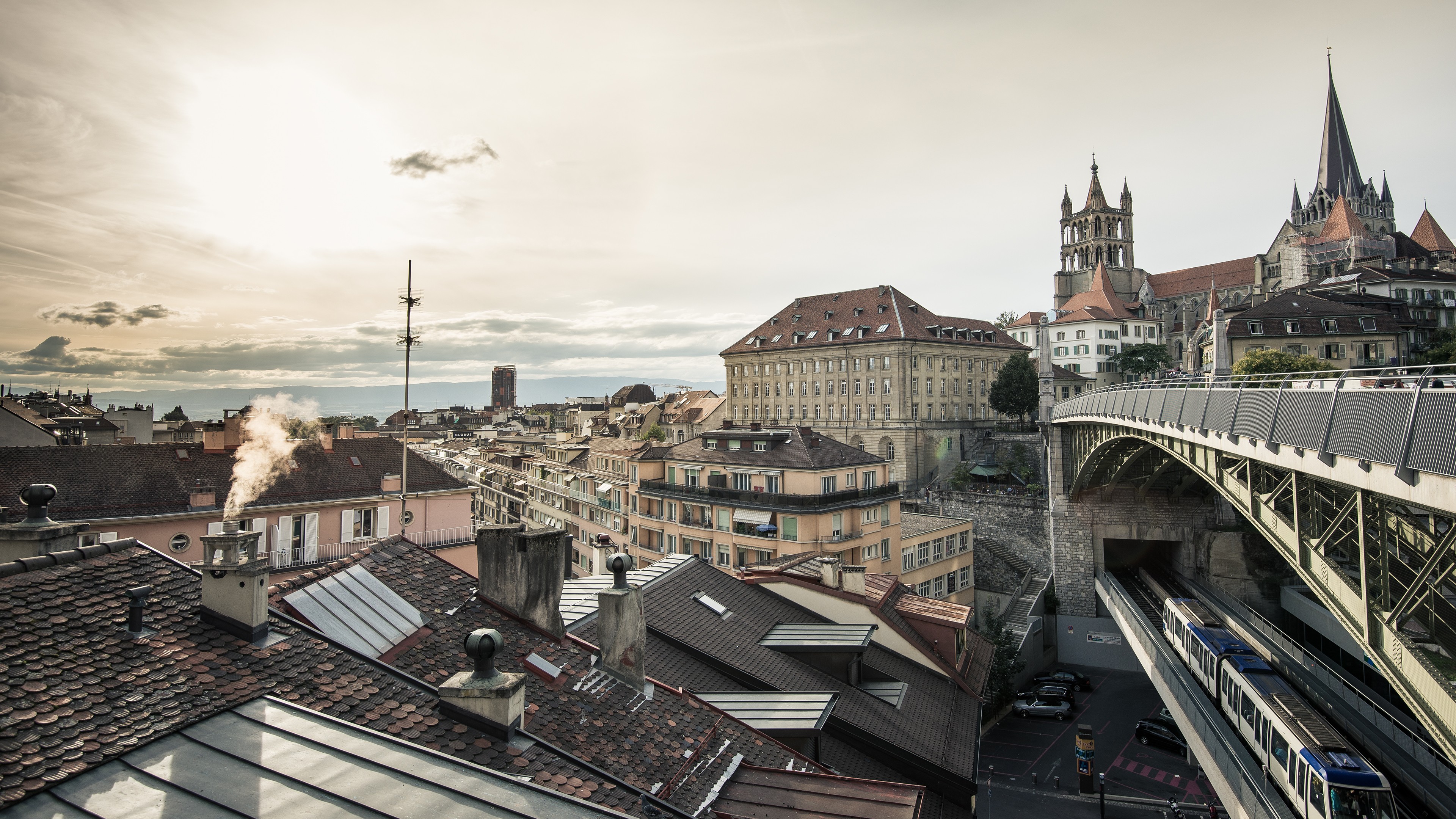Cityscape of Lausanne, Switzerland with a train bridge HD Wallpaper