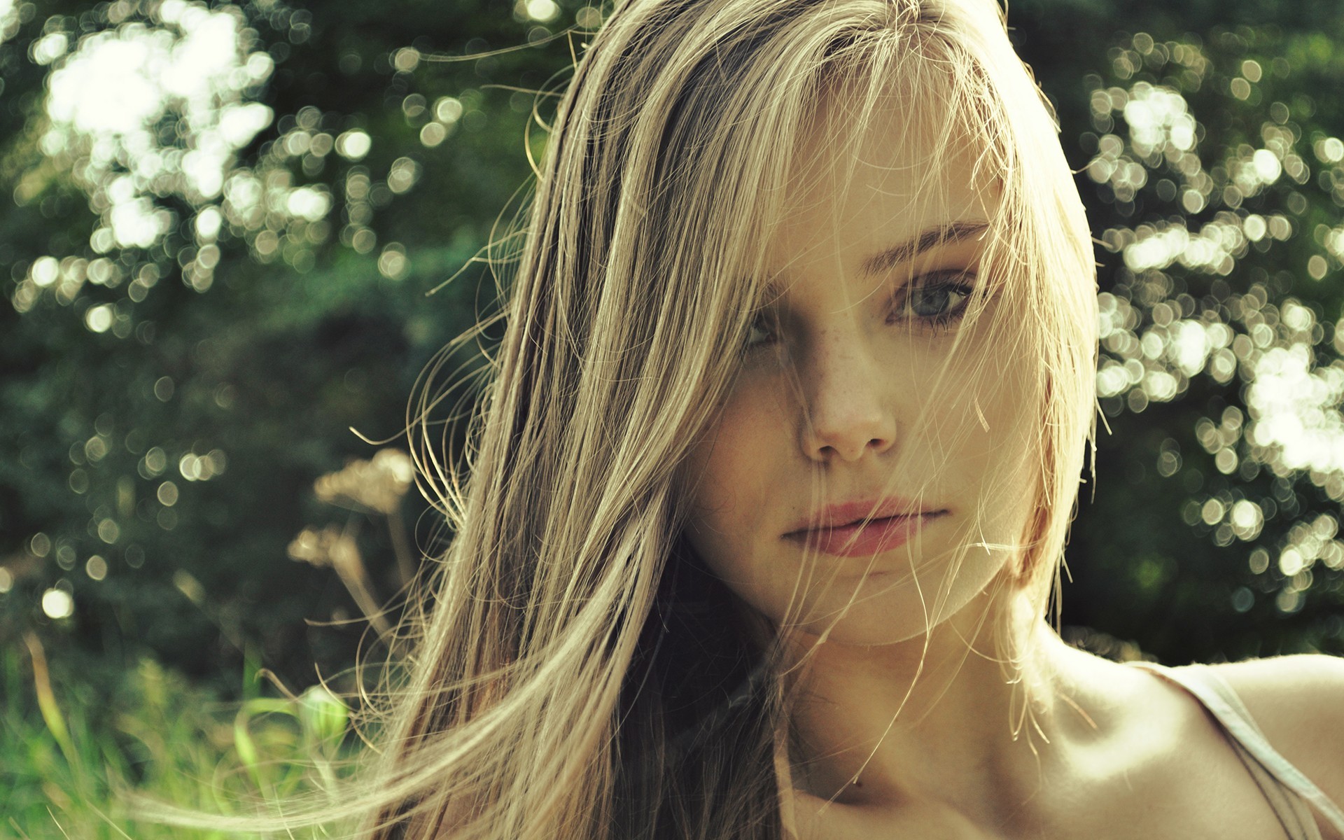 Portrait of a blonde woman outdoors HD Wallpaper