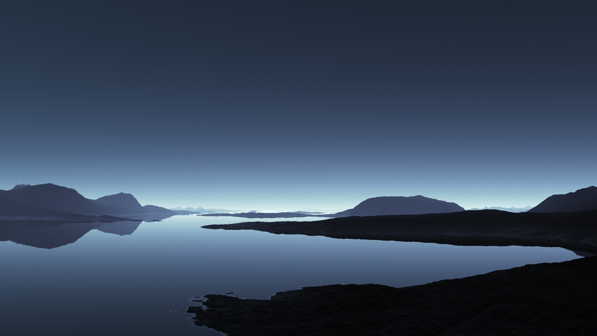 Calm lake reflecting mountains under a clear sky HD Wallpaper