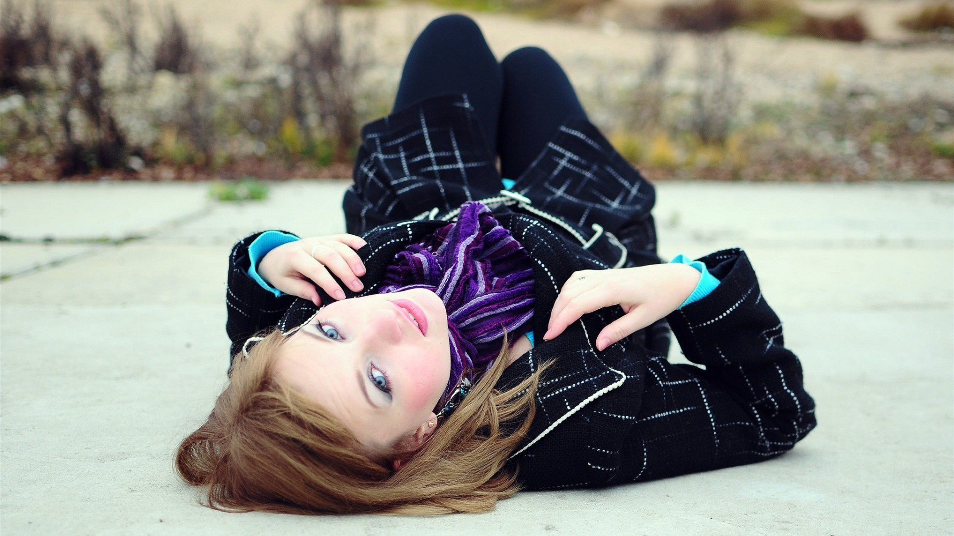 Woman lying on the floor outdoors HD Wallpaper