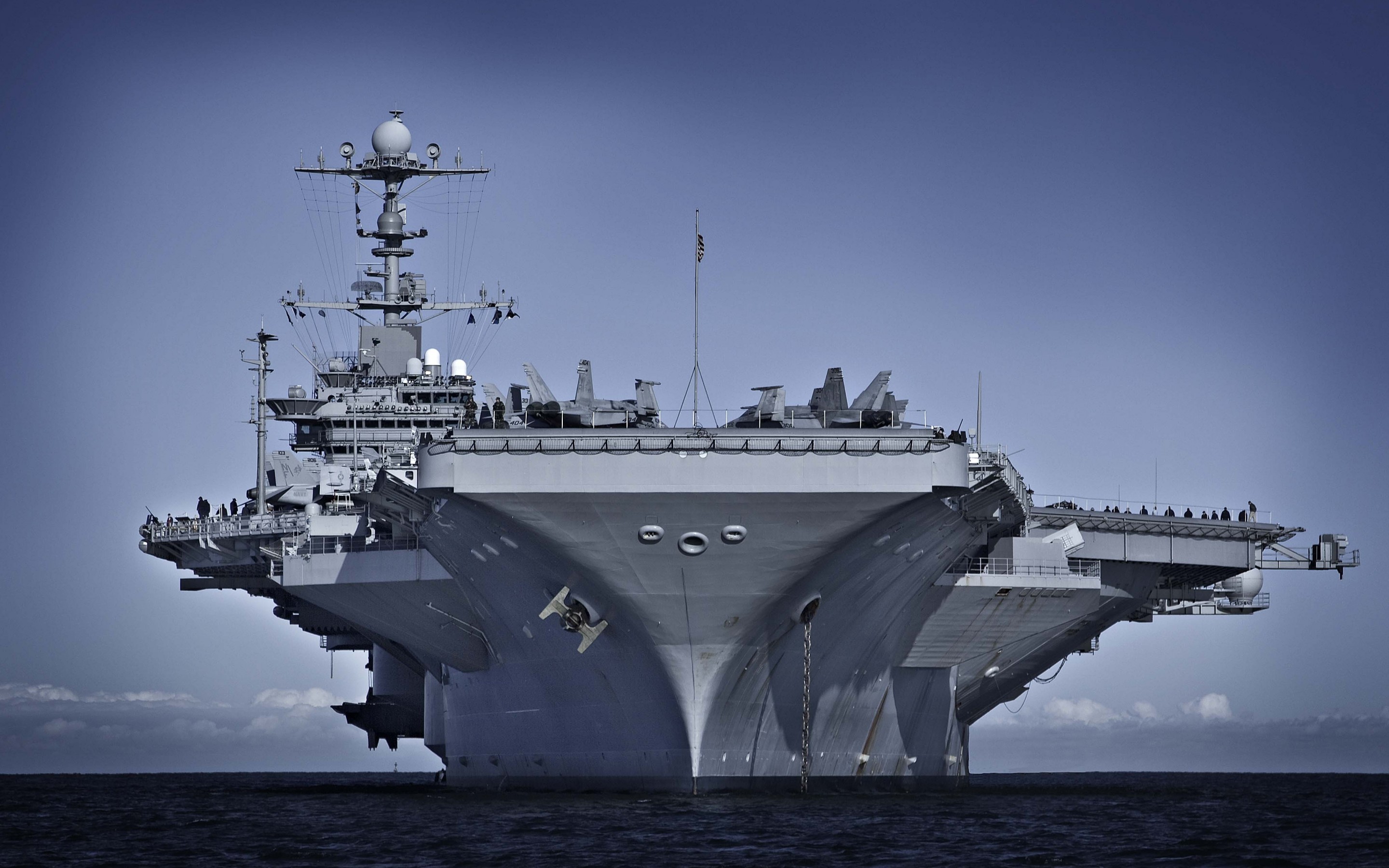 Military aircraft carrier at sea HD Wallpaper