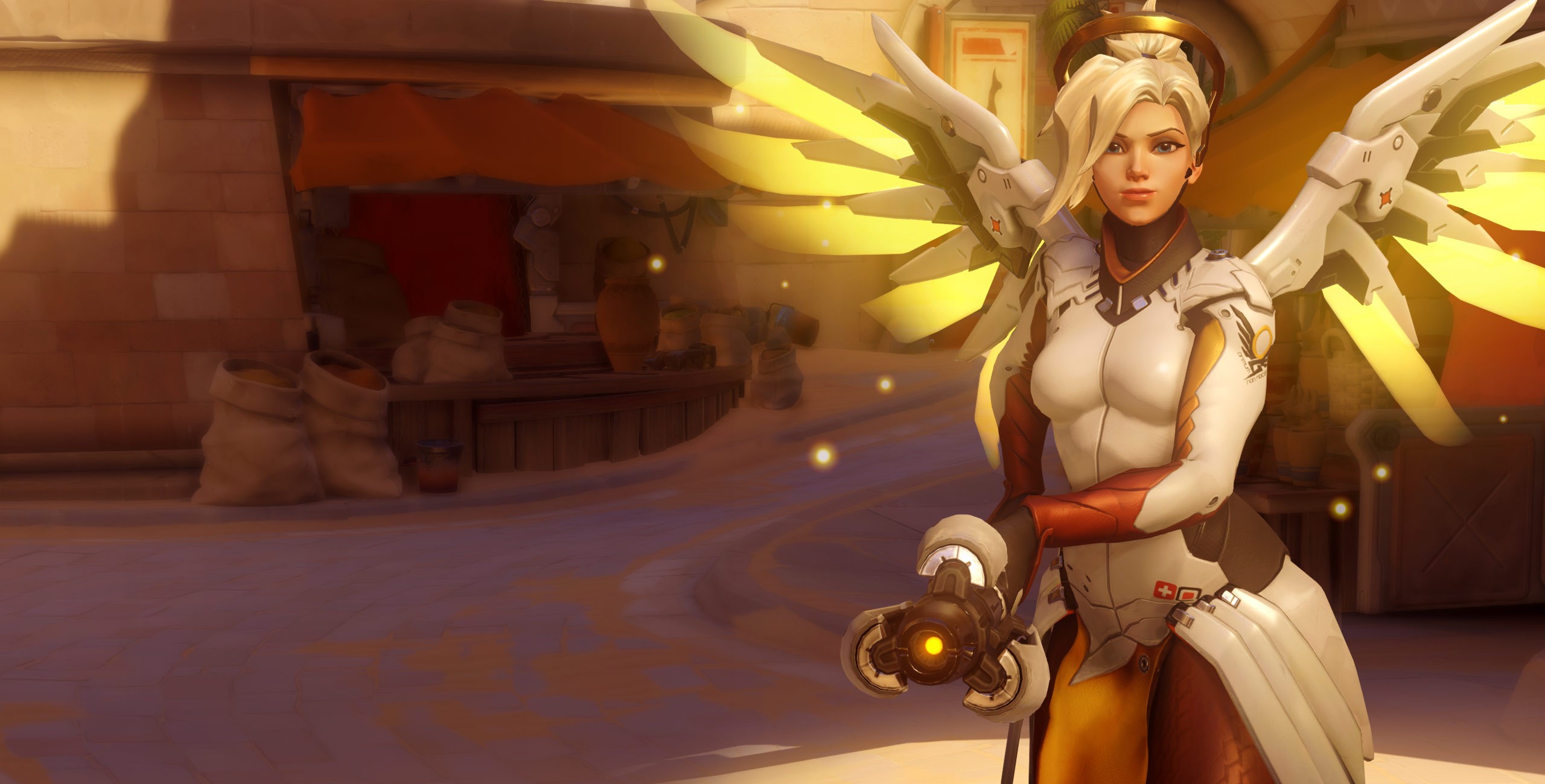 Mercy from Overwatch in a desert setting HD Wallpaper