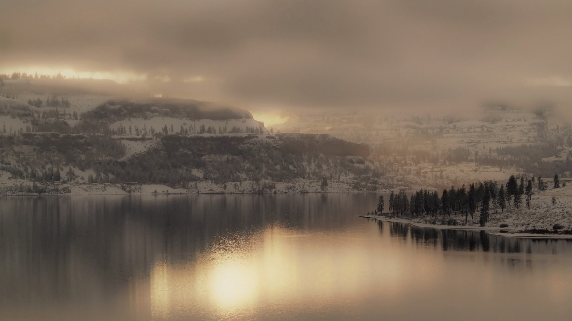 Winter lake and snow-covered mountains under cloudy sky HD Wallpaper