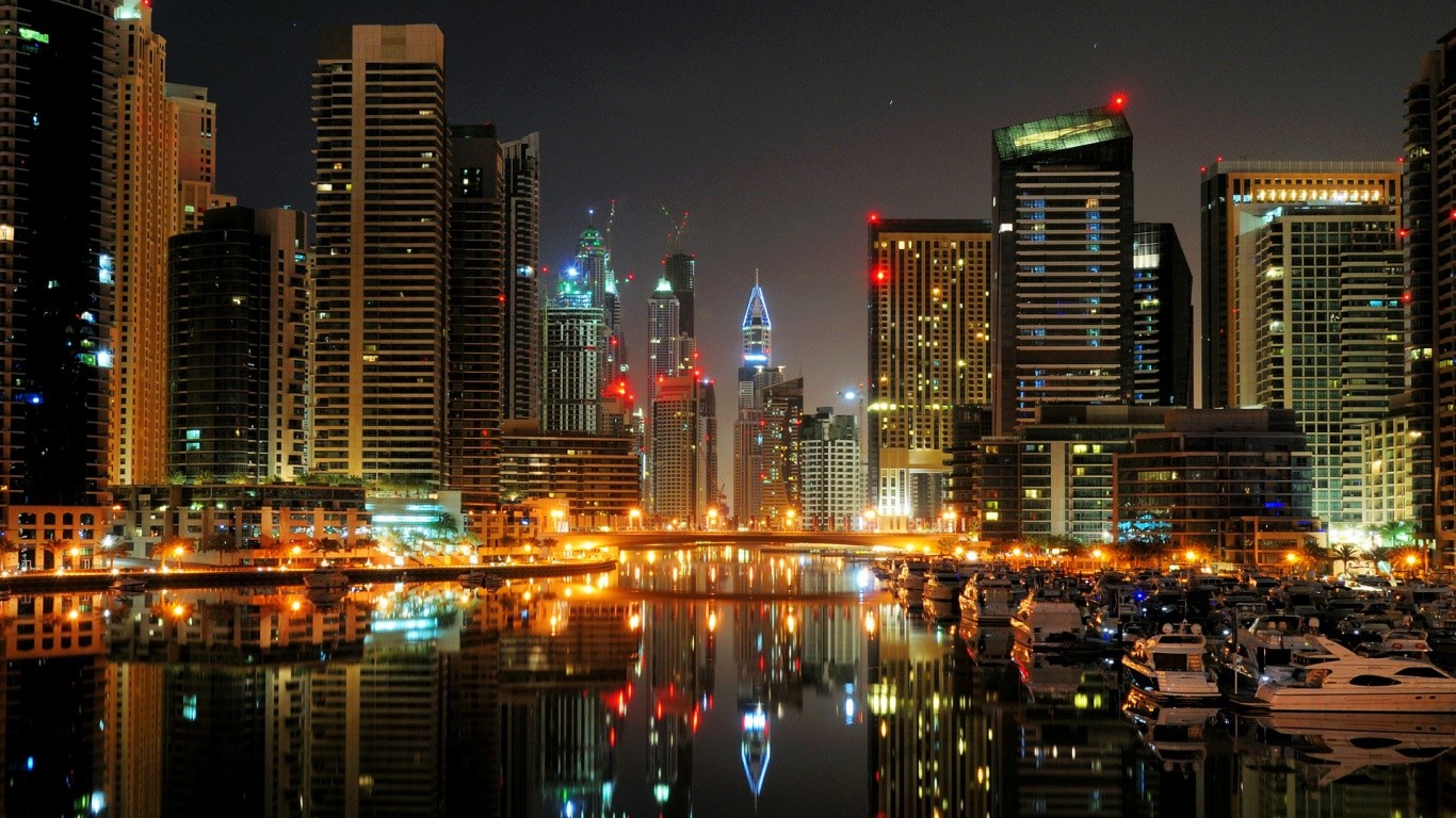 Dubai cityscape with skyscrapers and marina at night HD Wallpaper