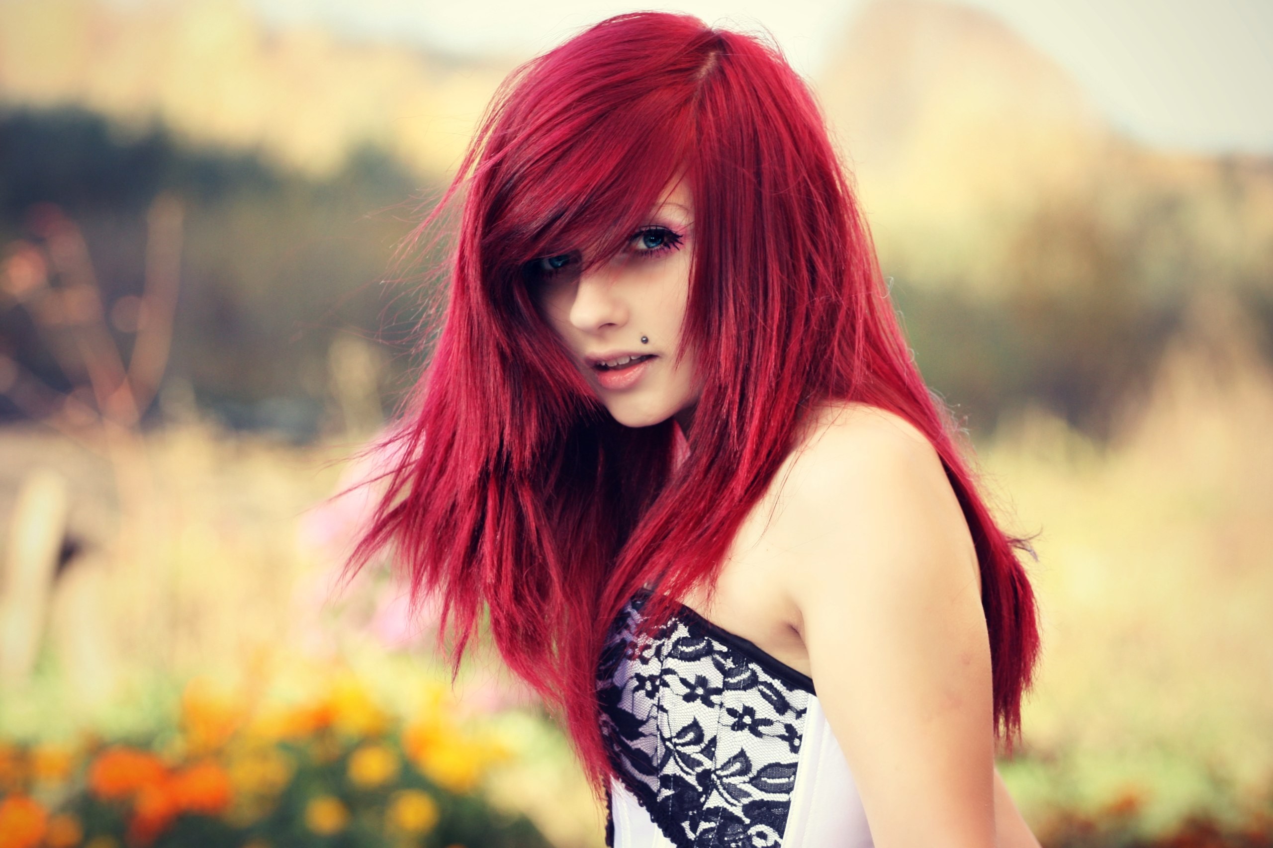 Woman with red hair and a piercing outdoors HD Wallpaper