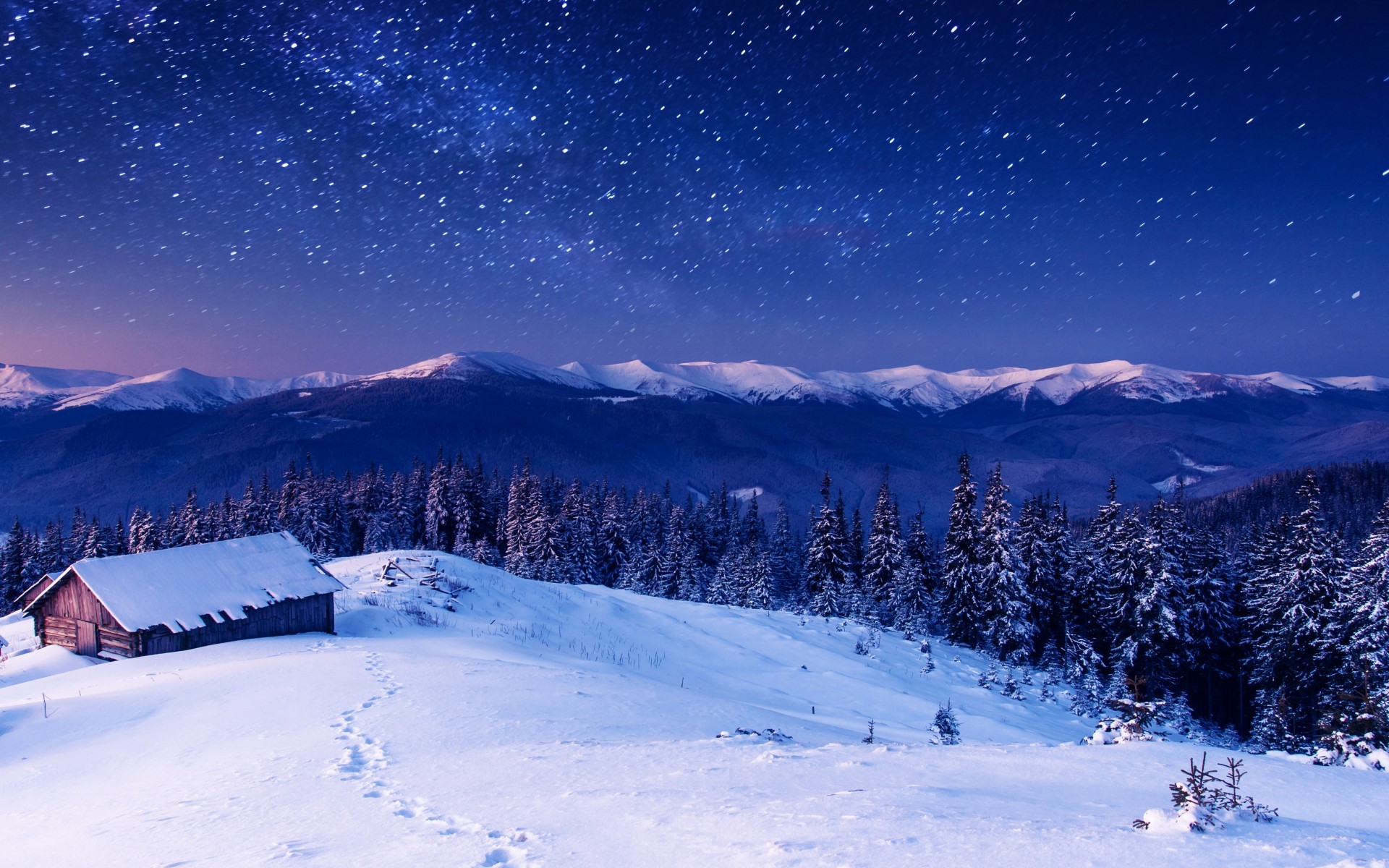 Winter mountains landscape with a cabin under the stars HD Wallpaper