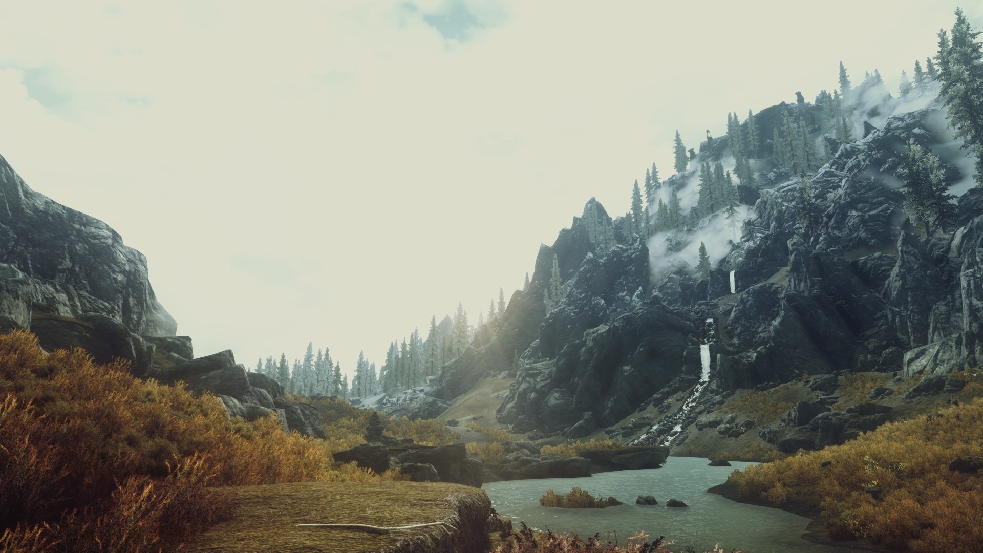 The Elder Scrolls V: Skyrim mountains and tundra landscape HD Wallpaper