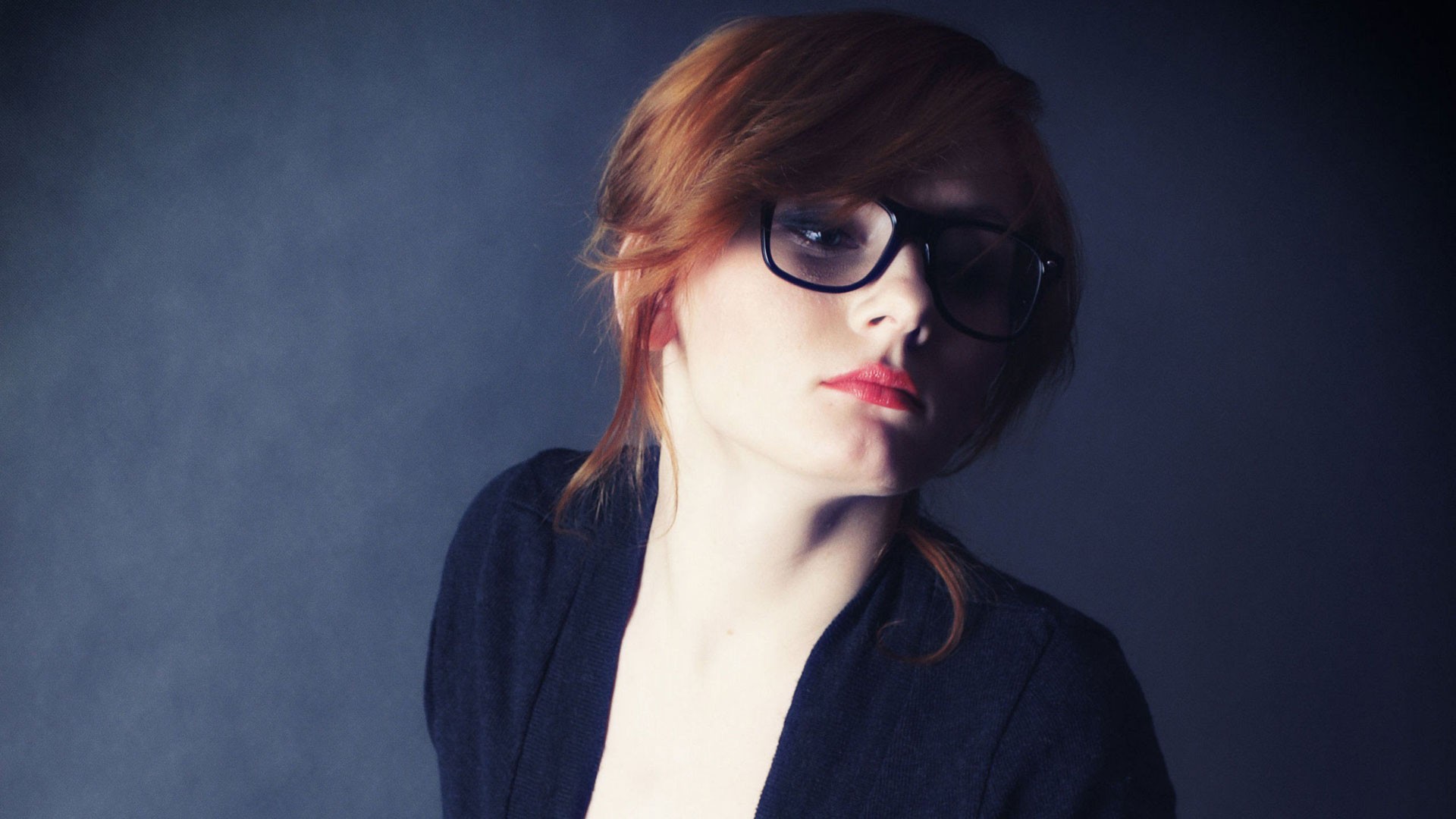 Redhead woman with glasses wearing a black cardigan HD Wallpaper
