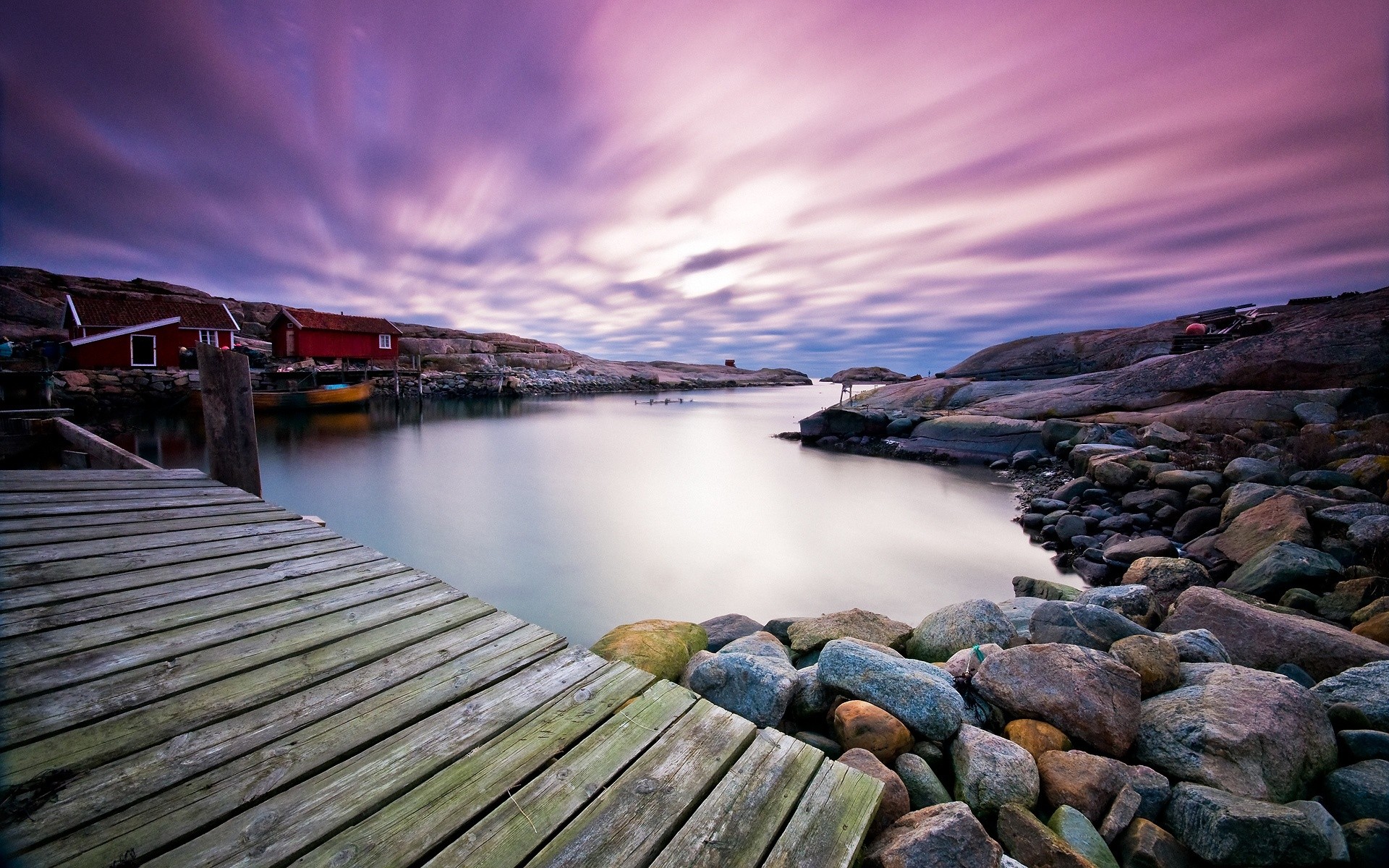 Long exposure of a Swedish village by the water at dusk HD Wallpaper
