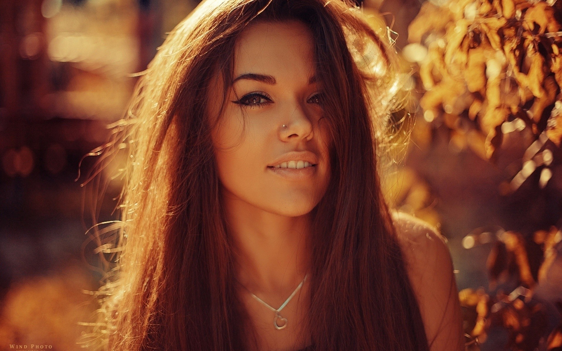 Natali Danish with long brown hair and nose piercing HD Wallpaper