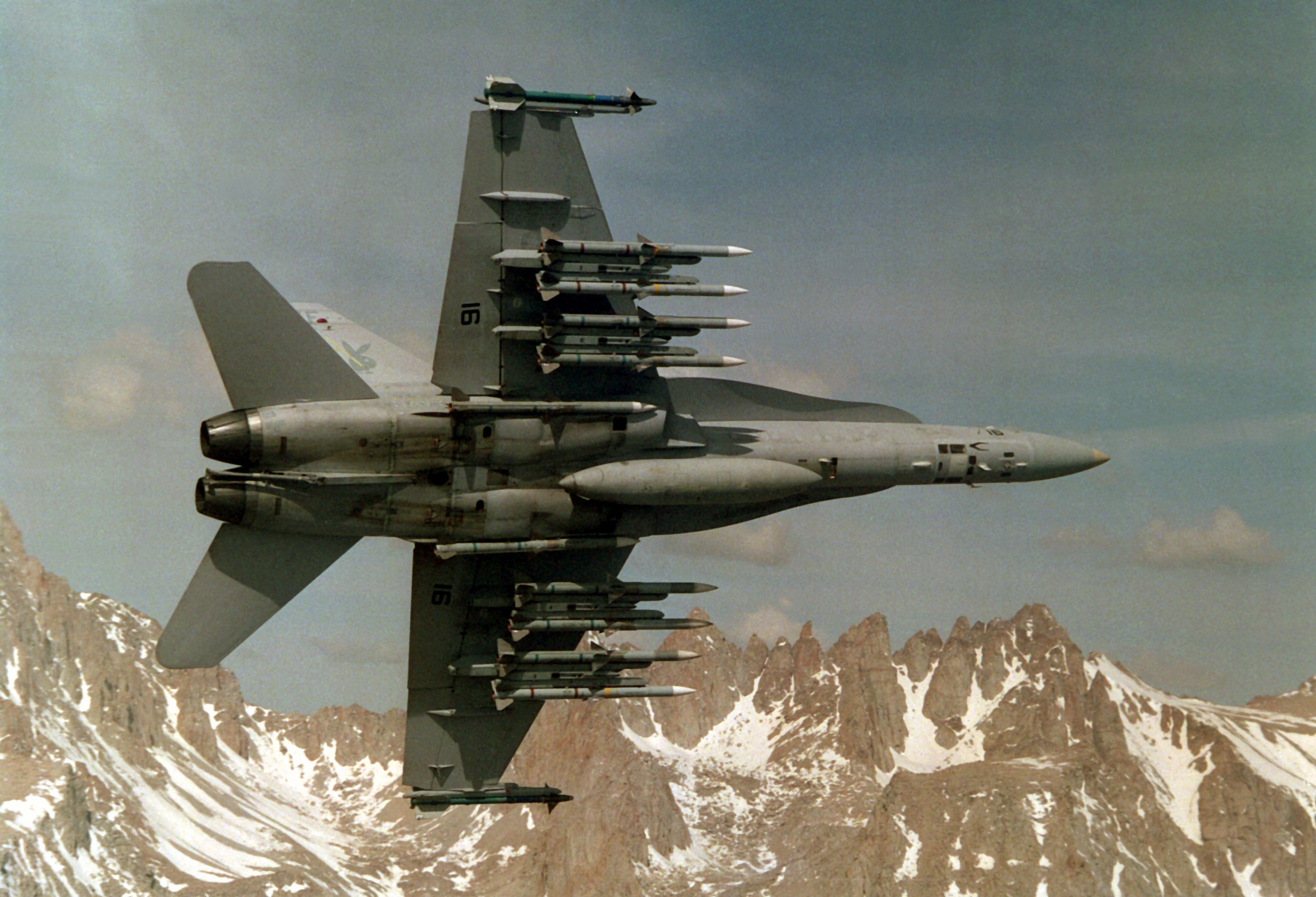 McDonnell Douglas FA-18 Hornet flying over mountains HD Wallpaper