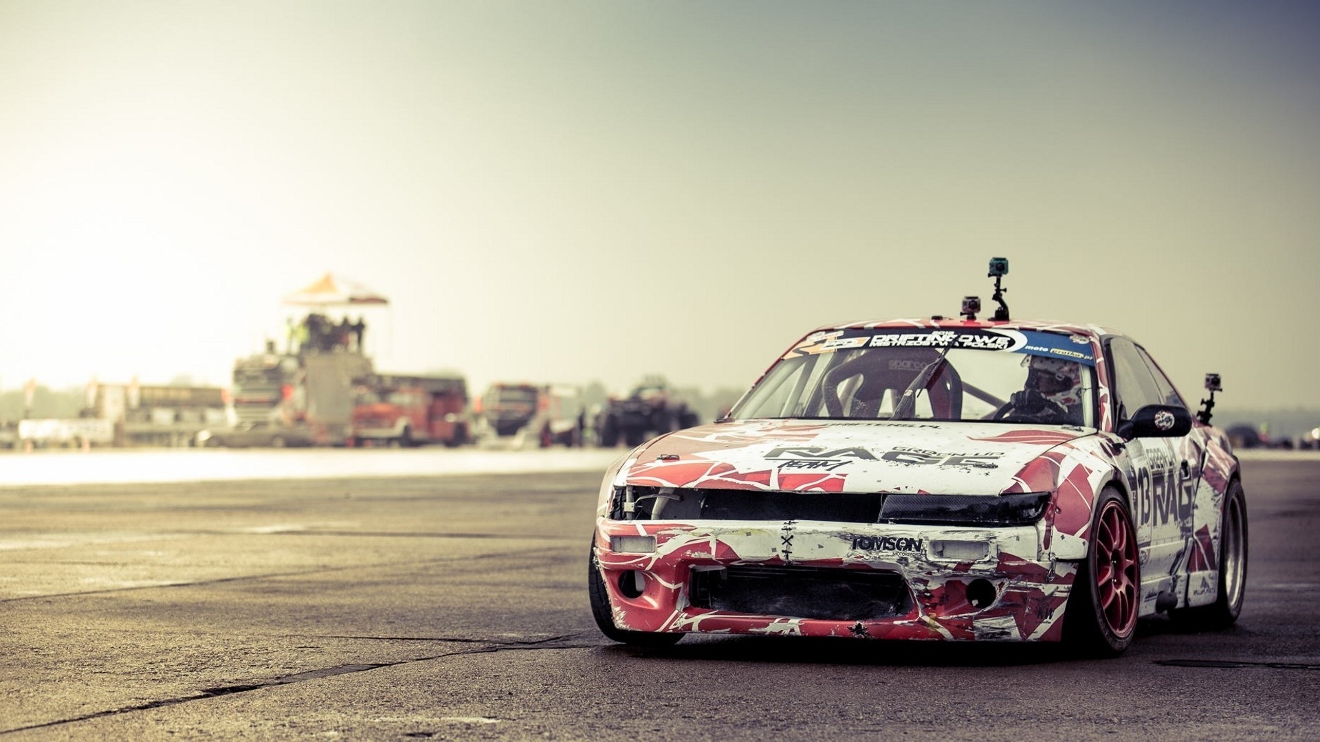 Drifting car with red and white decals HD Wallpaper