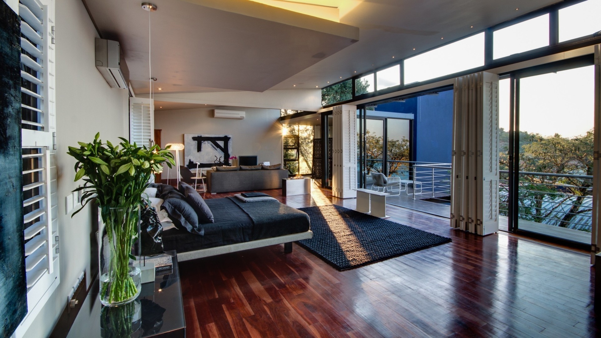 Modern bedroom with large windows and balcony HD Wallpaper