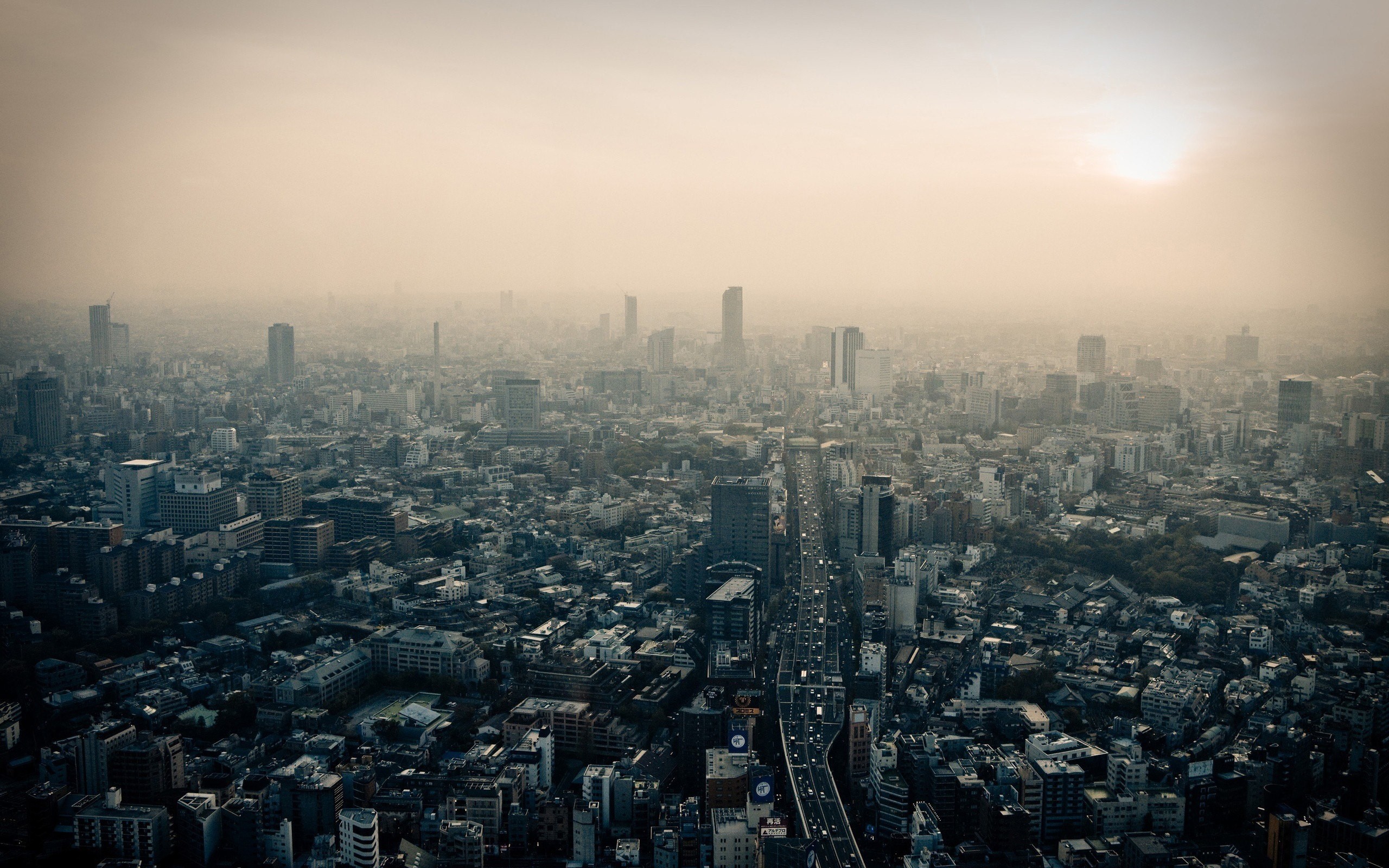 Aerial view of Tokyo cityscape with skyscrapers and highway HD Wallpaper