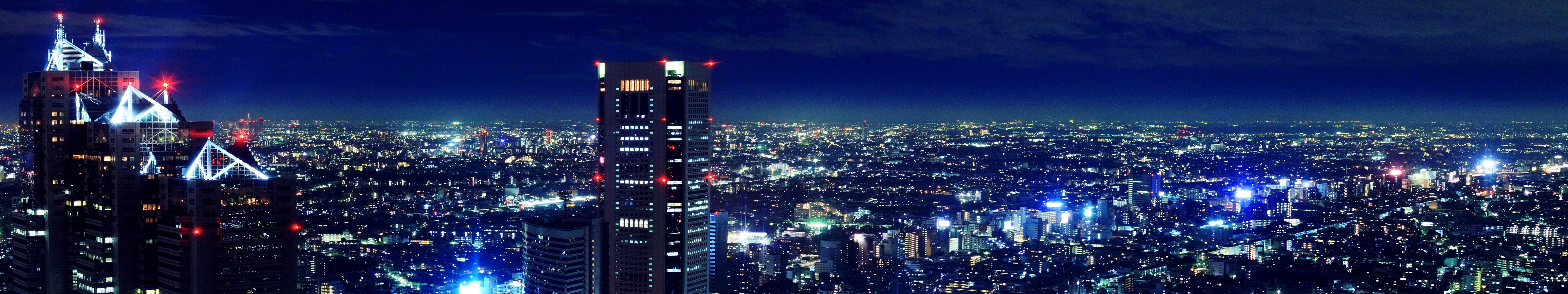 Night cityscape of Japan with illuminated skyscrapers HD Wallpaper