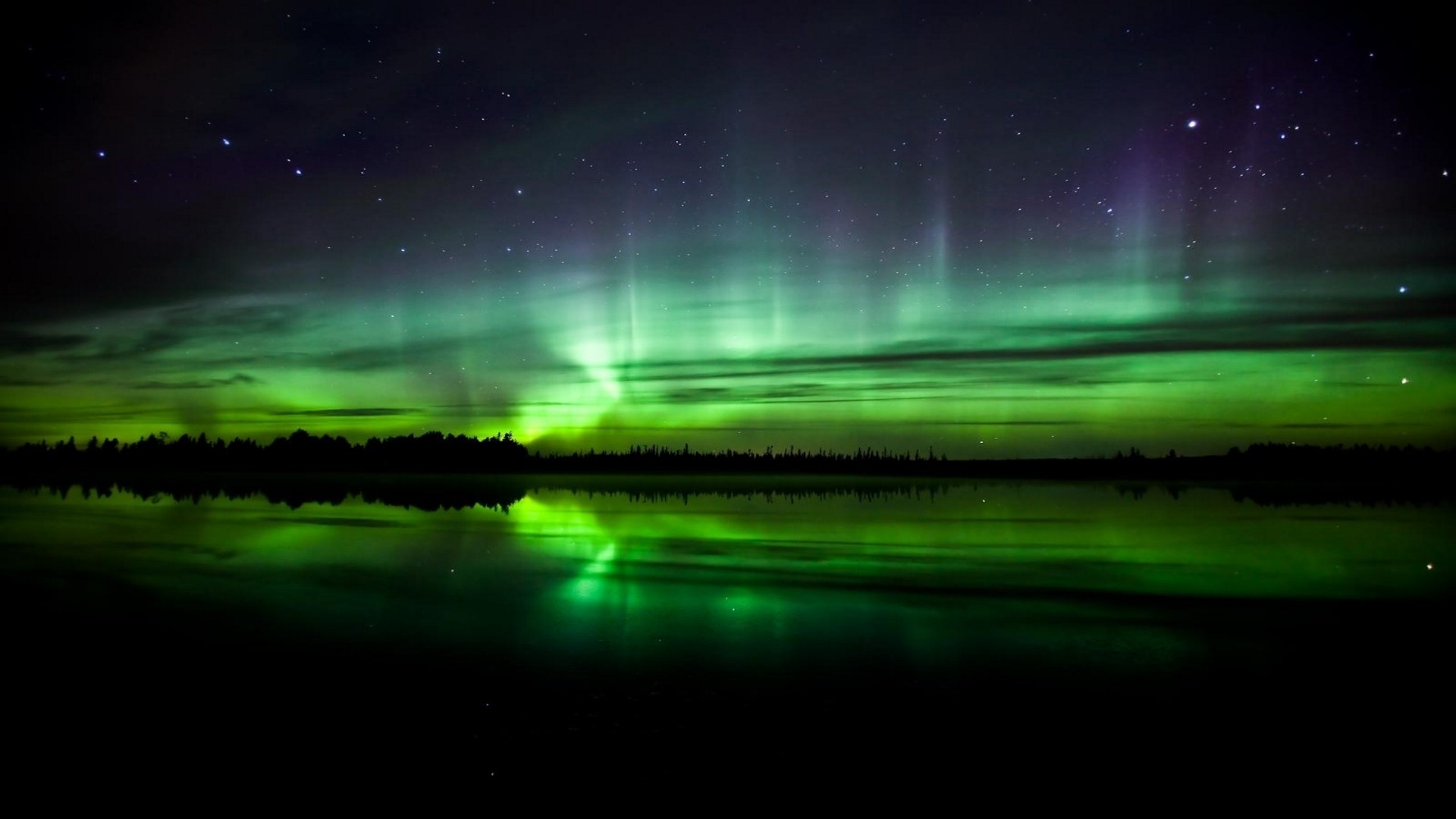 Aurora Borealis over a lake with stars HD Wallpaper