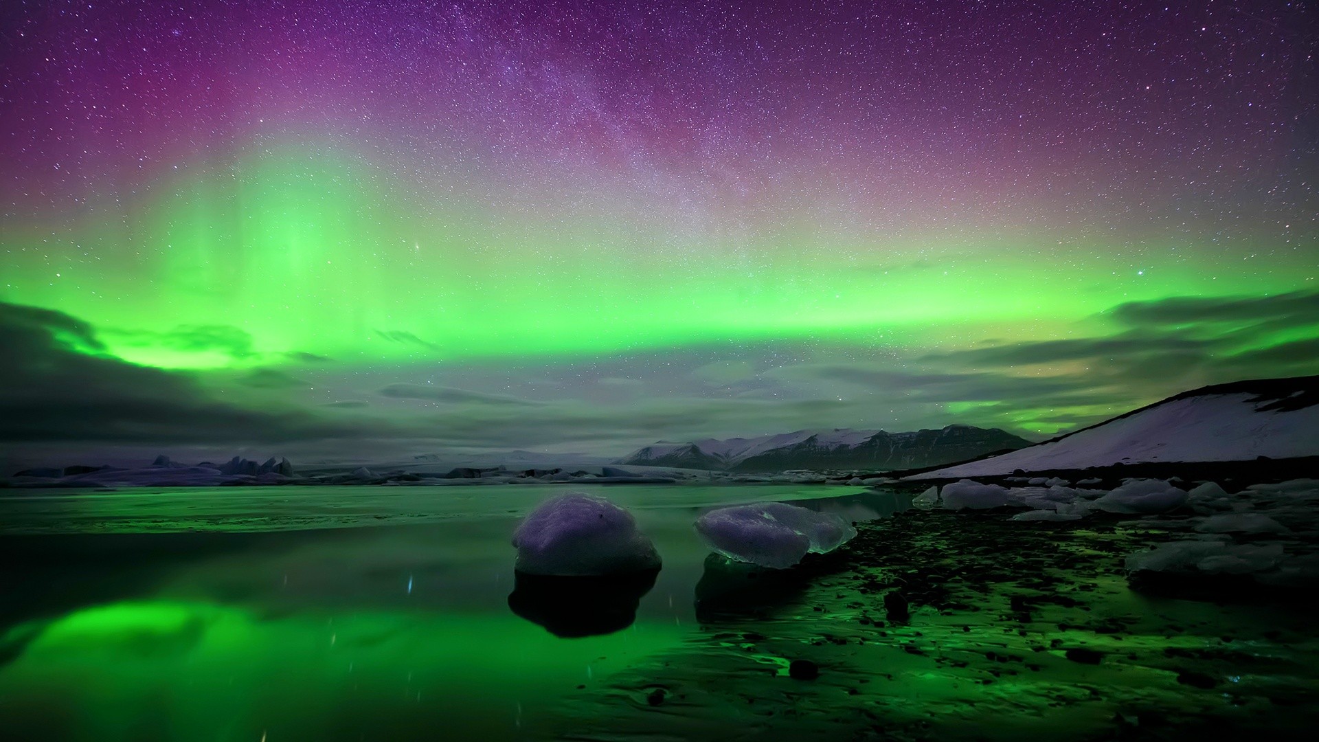 Aurora Borealis over a glacial lake in Norway HD Wallpaper
