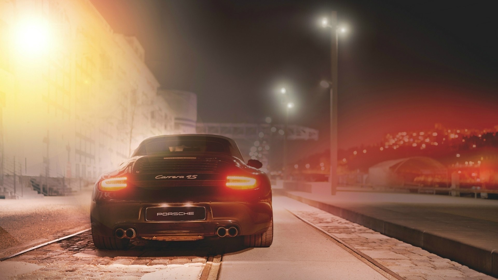 Porsche 911 Carrera S on a city street at night HD Wallpaper