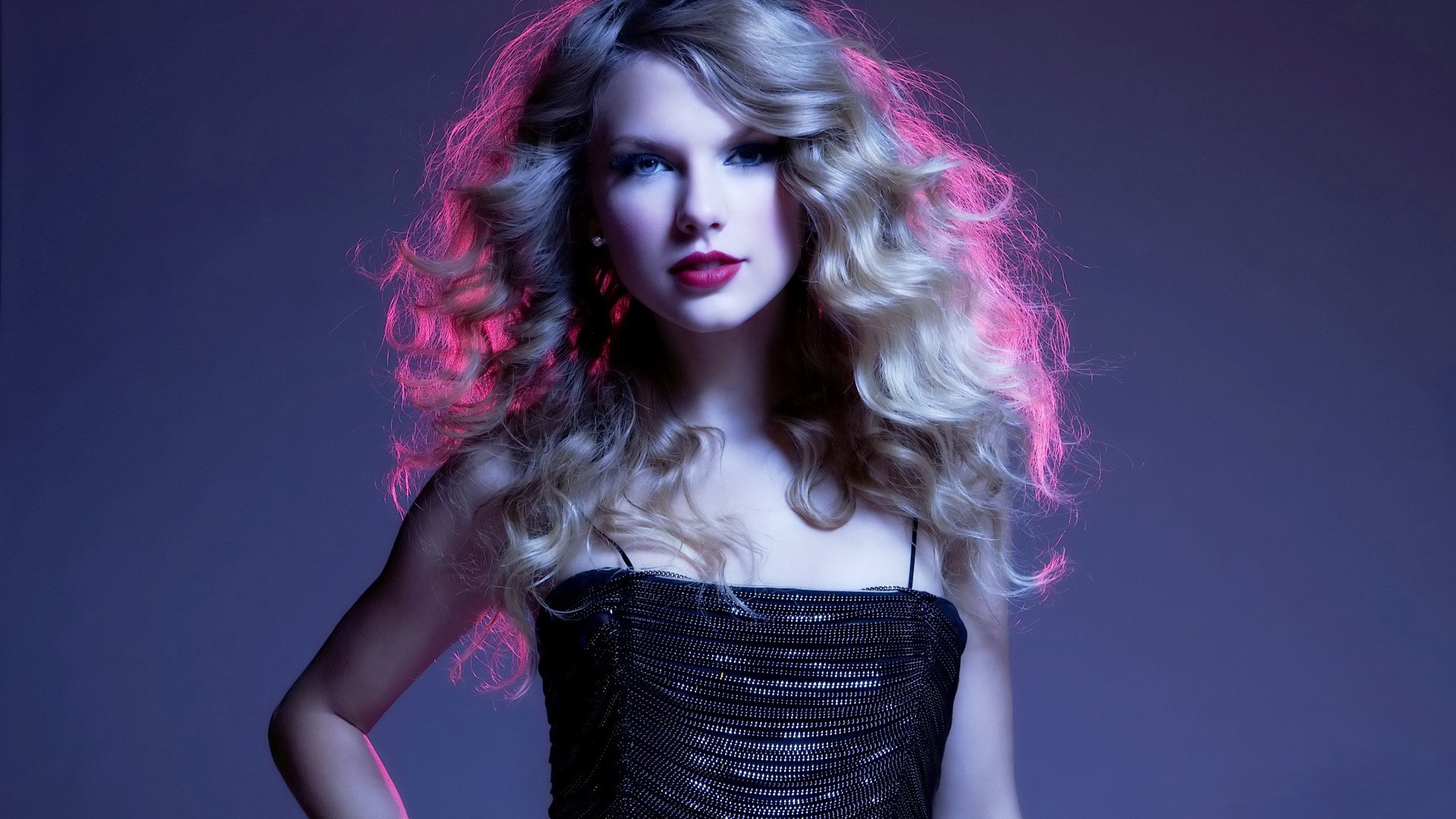 Taylor Swift in a sparkly dress with pink lighting HD Wallpaper