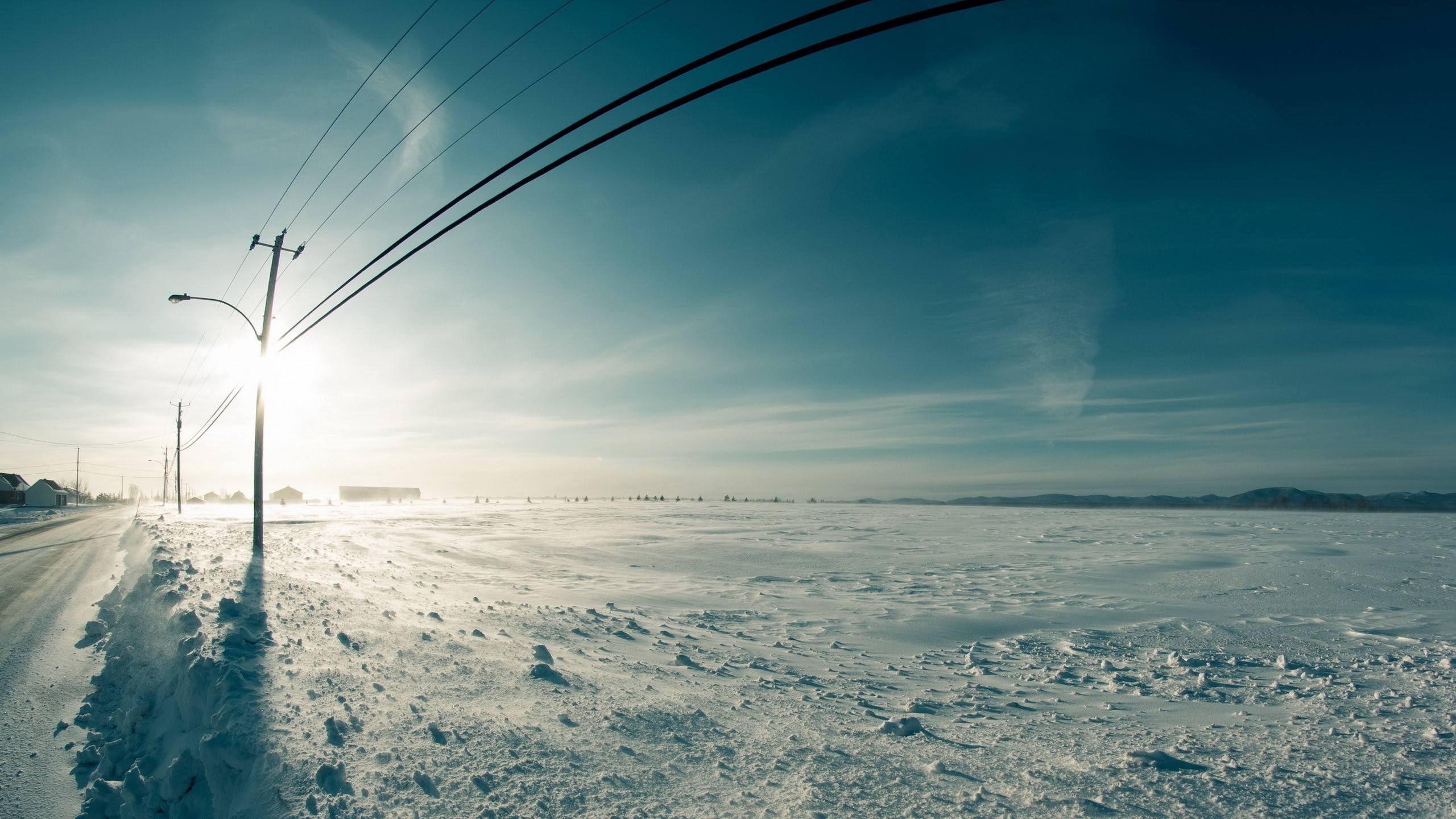 Winter landscape with power lines and sun HD Wallpaper