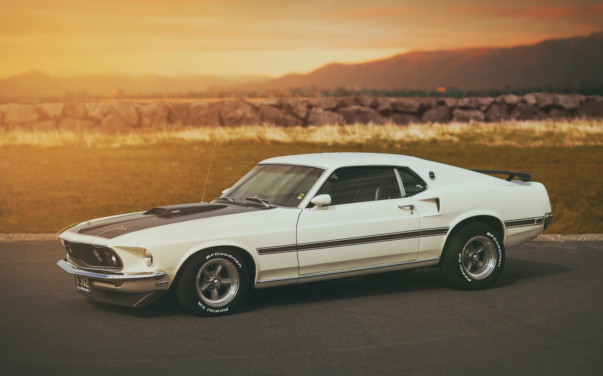 White 1969 Ford Mustang Mach 1 parked at sunset HD Wallpaper