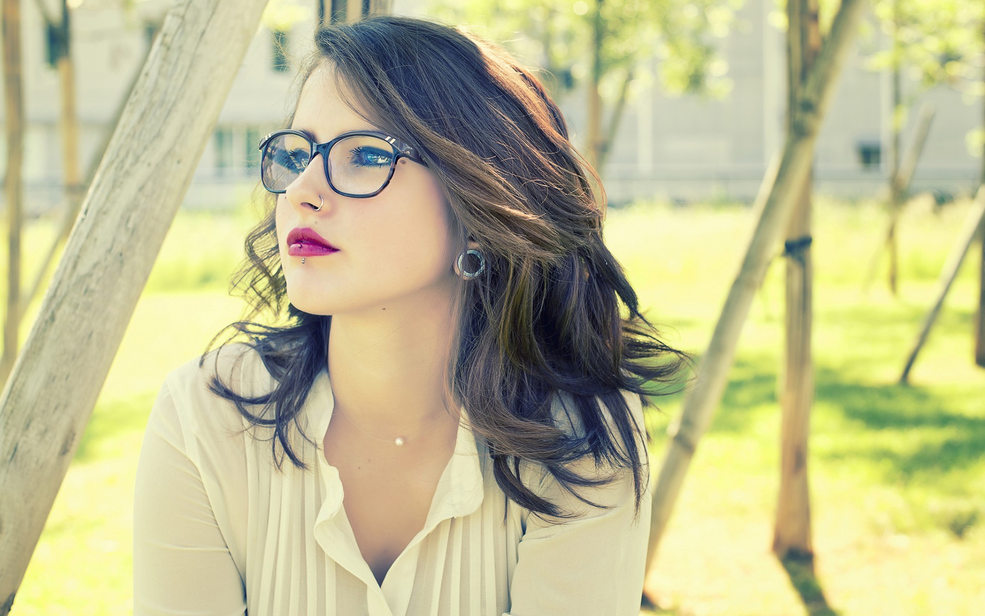 Woman with glasses and piercings outdoors HD Wallpaper
