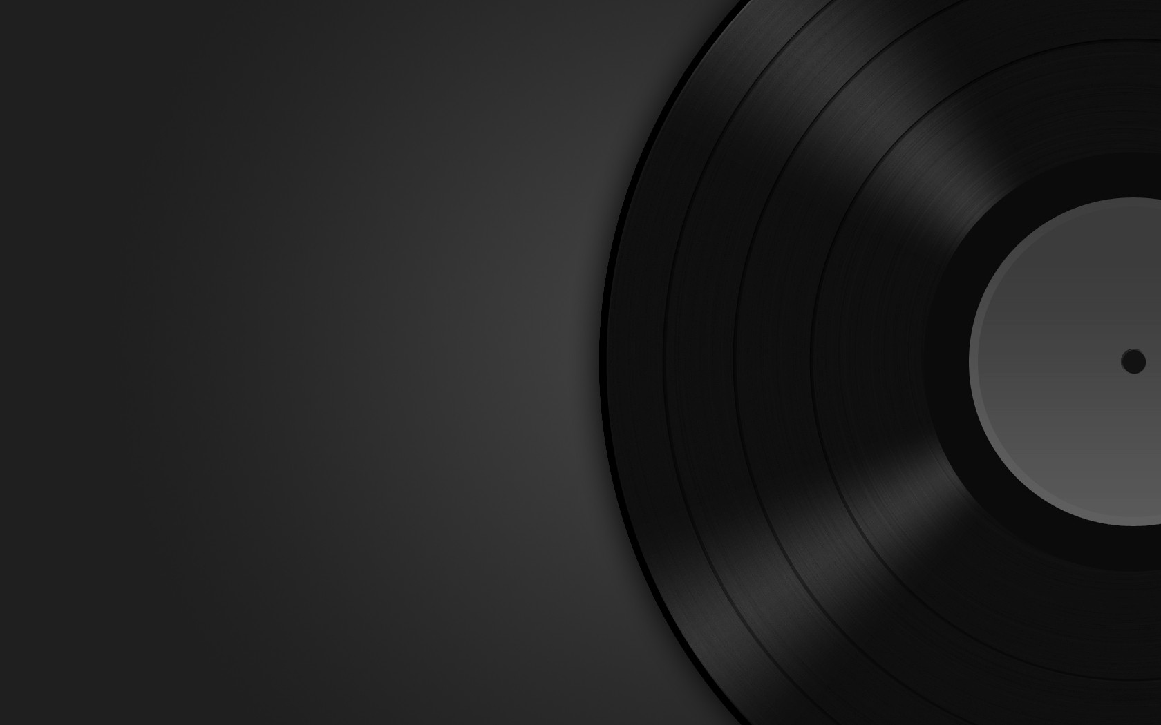 Close-up of a black vinyl record HD Wallpaper