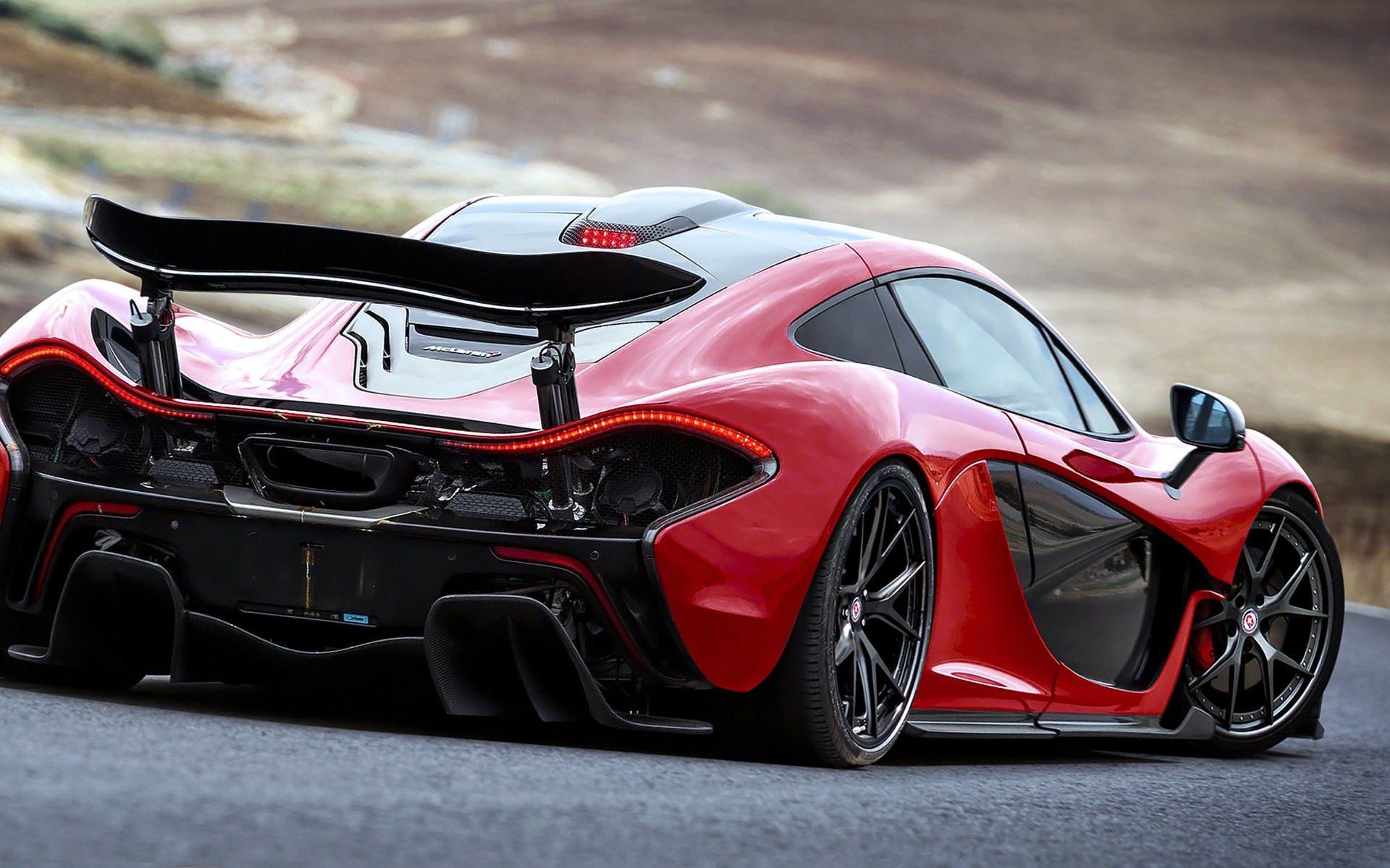 Red McLaren P1 sports car rear view HD Wallpaper