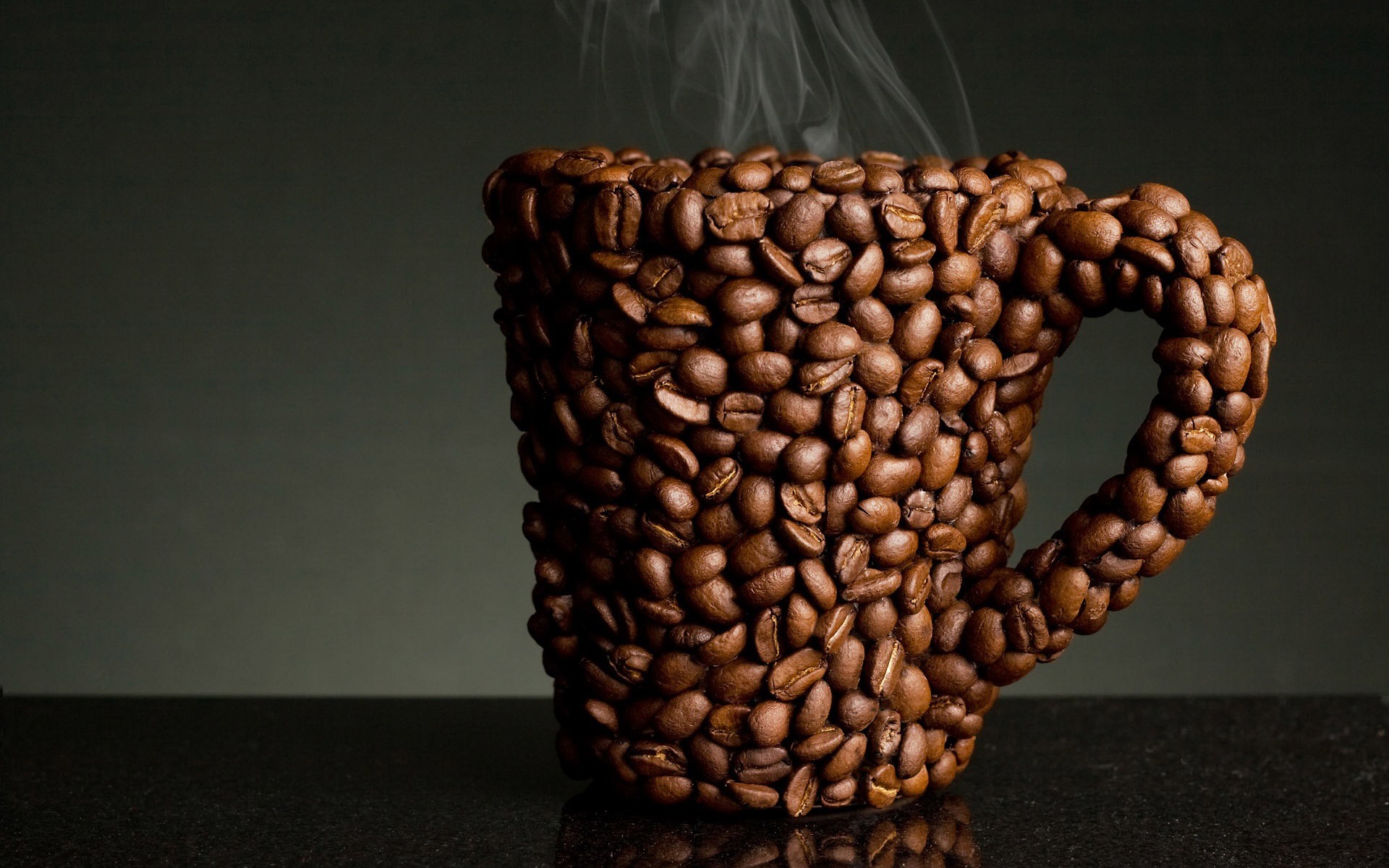 Cup made of coffee beans with steam HD Wallpaper
