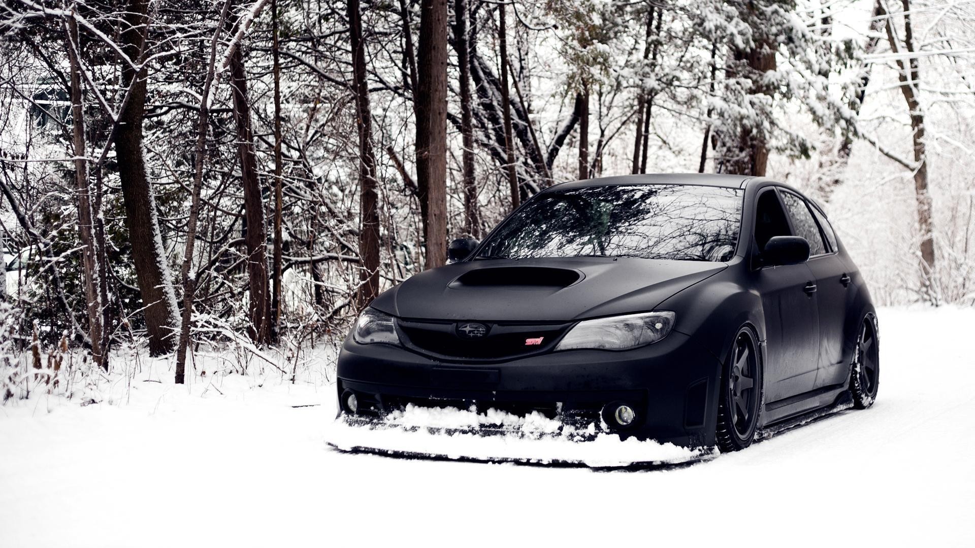 Matte black Subaru Impreza WRX STI in the snow HD Wallpaper