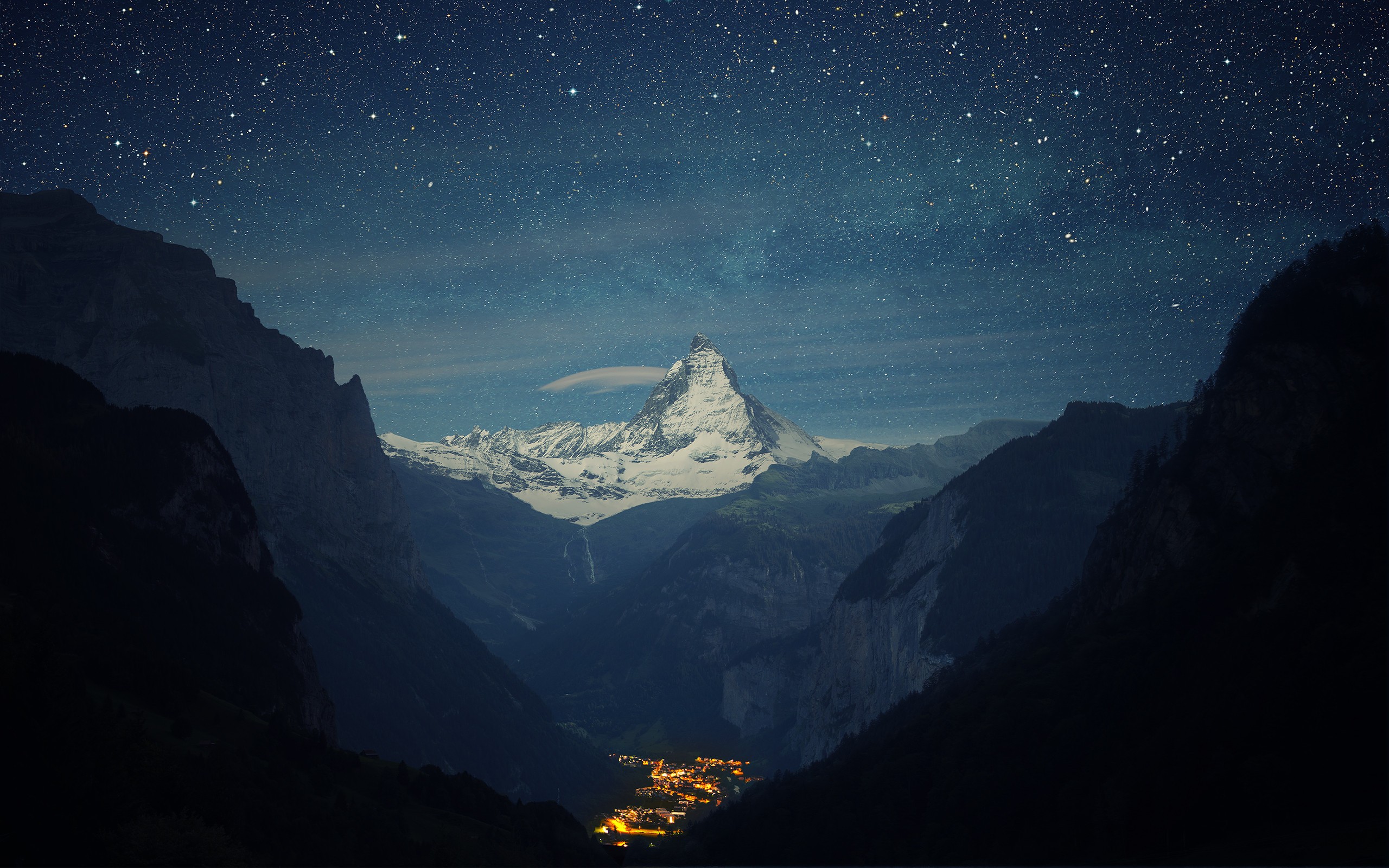 Matterhorn mountain range under a starry night sky HD Wallpaper