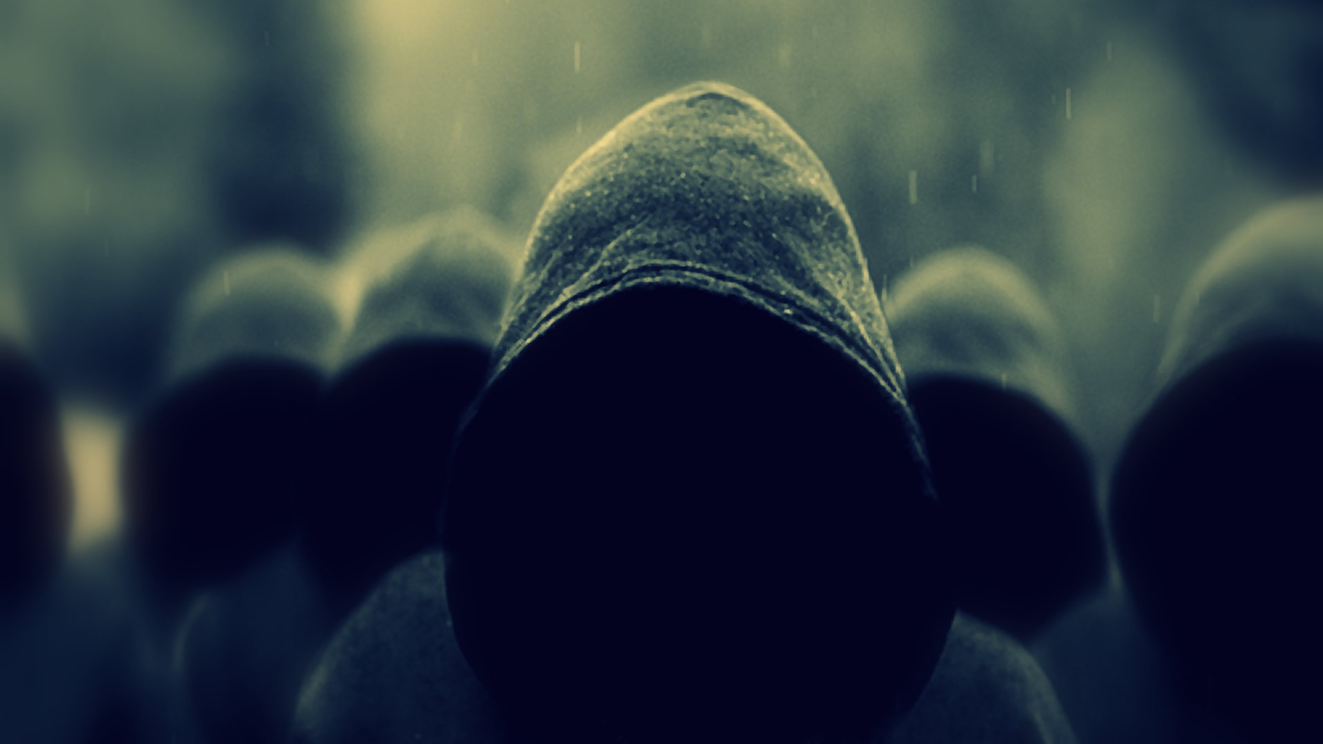 People in hoods in the rain HD Wallpaper