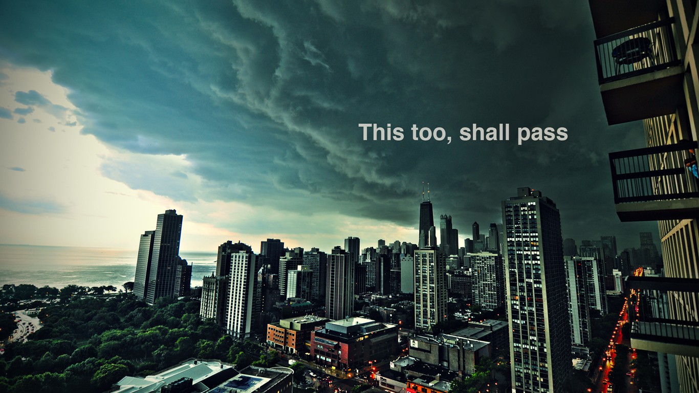 Chicago cityscape under stormy clouds with quote HD Wallpaper