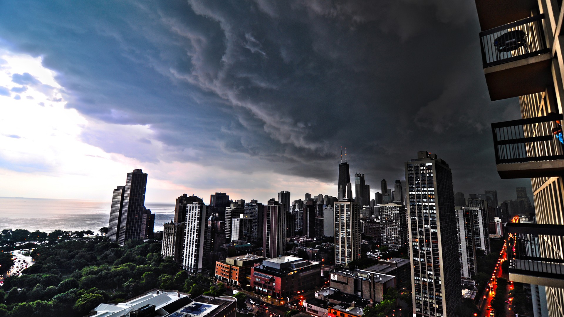 Chicago cityscape under stormy dark clouds HD Wallpaper