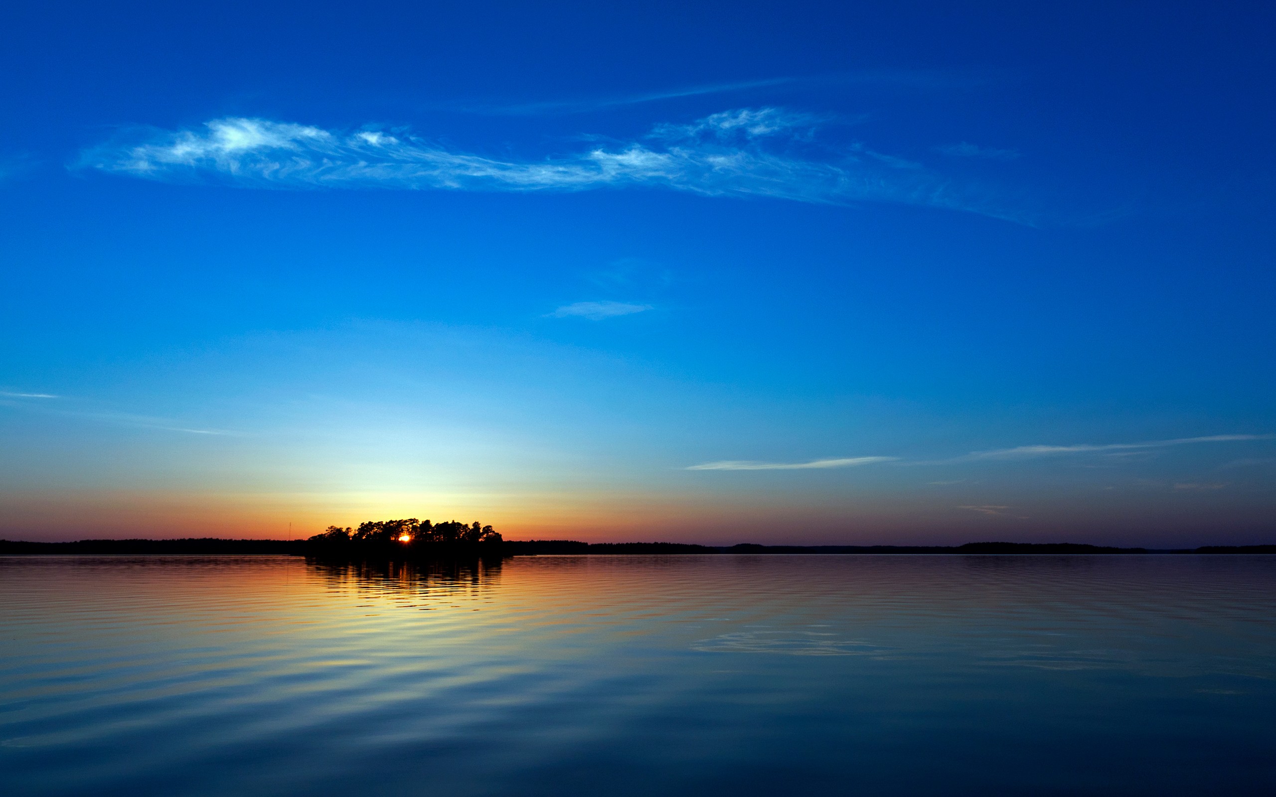 Sunset over a calm lake with an island HD Wallpaper