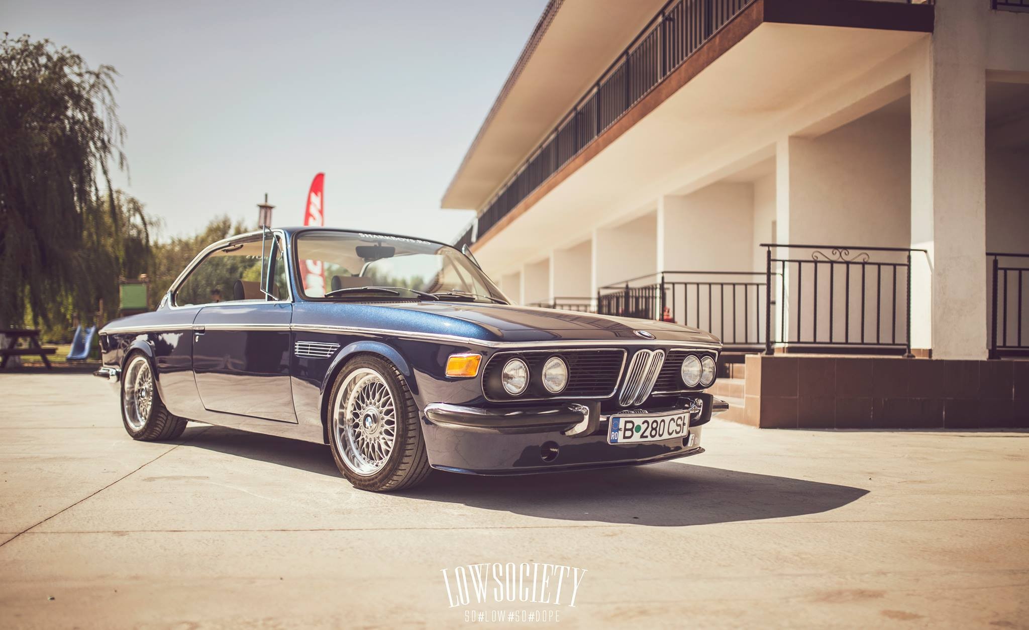 Blue BMW E9 Coupe parked outdoors HD Wallpaper