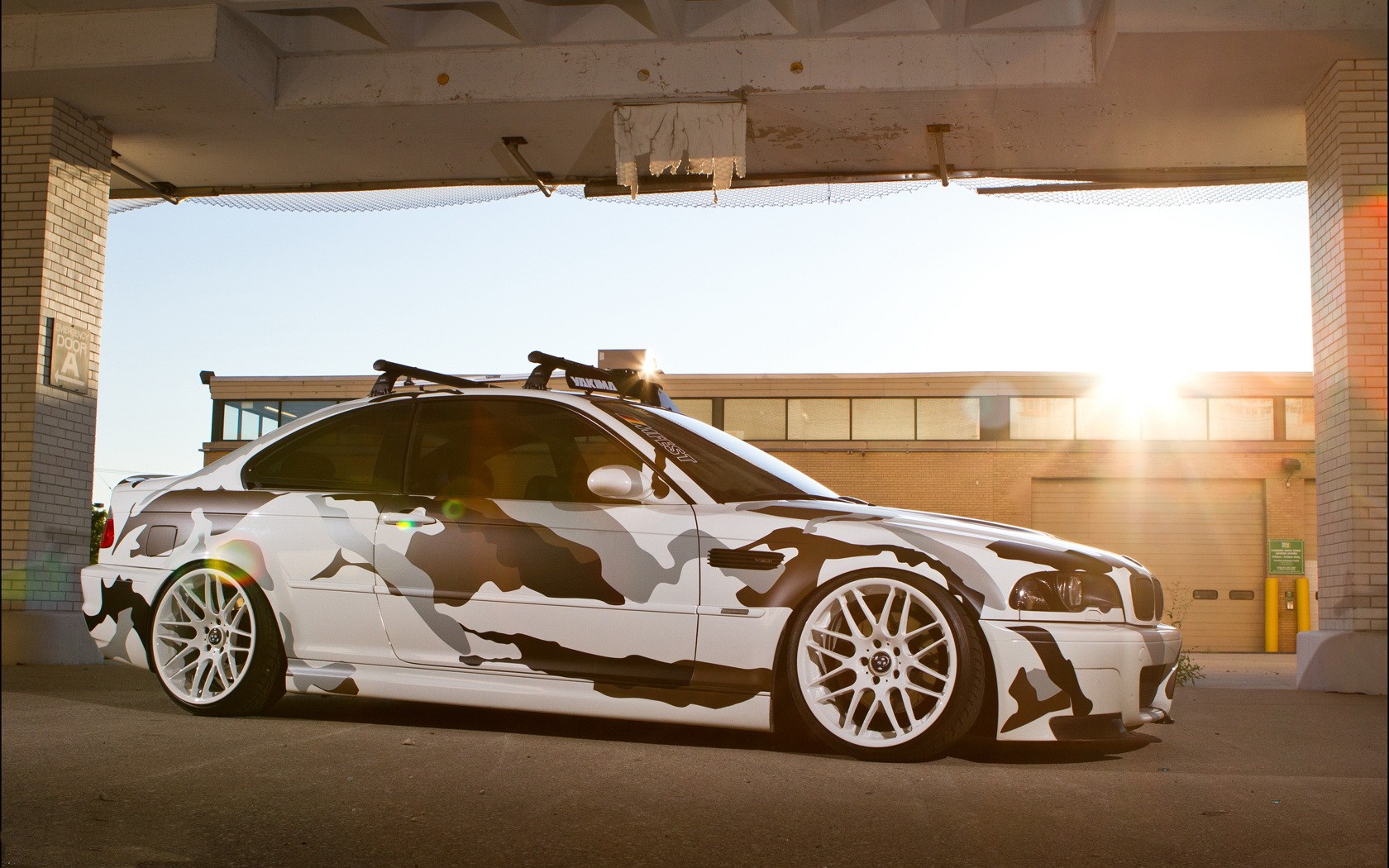 BMW with Camouflage Wrap and Roof Rack HD Wallpaper